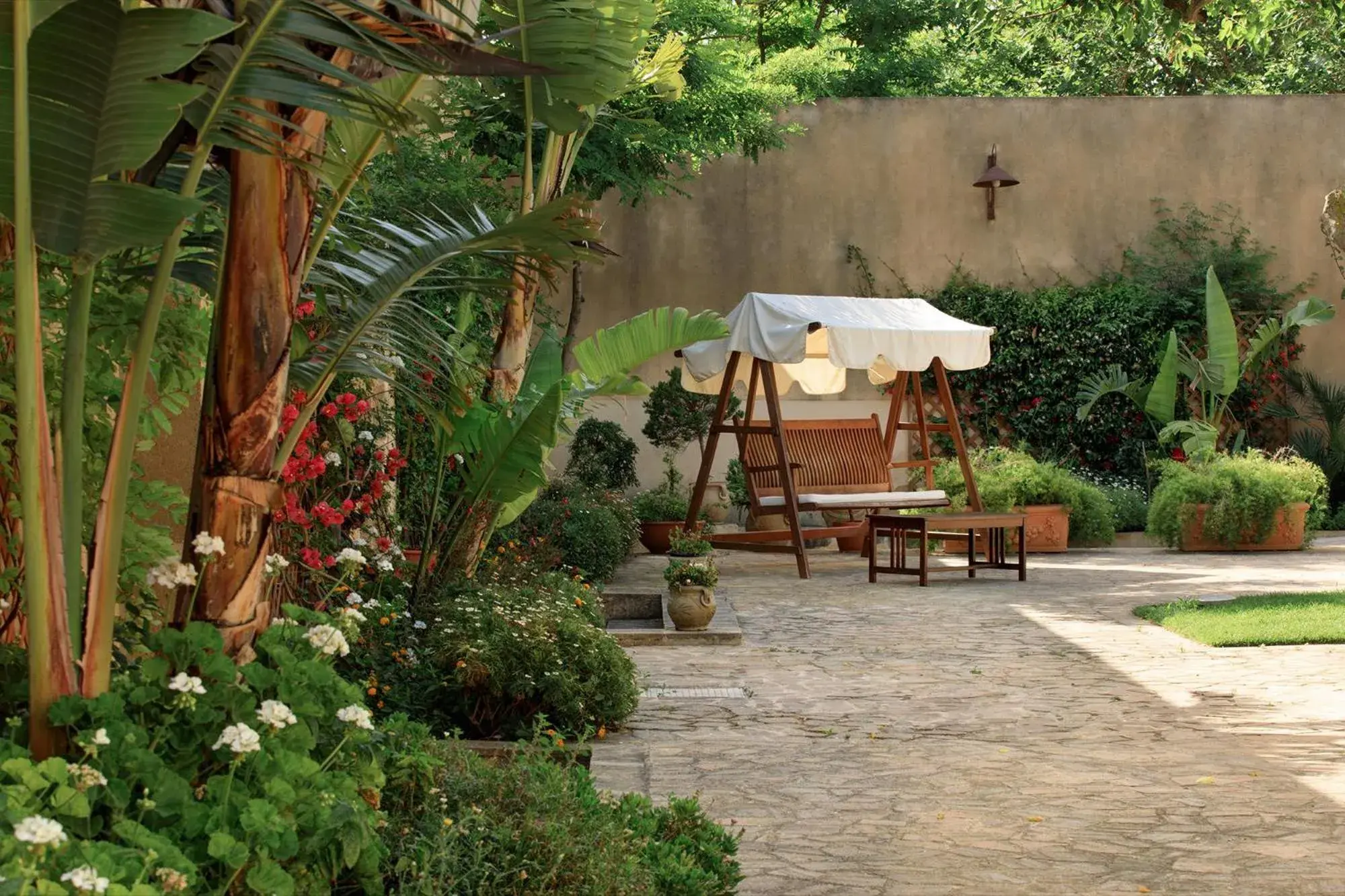 Patio, Garden in Hotel Baglio Oneto dei Principi di San Lorenzo - Luxury Wine Resort