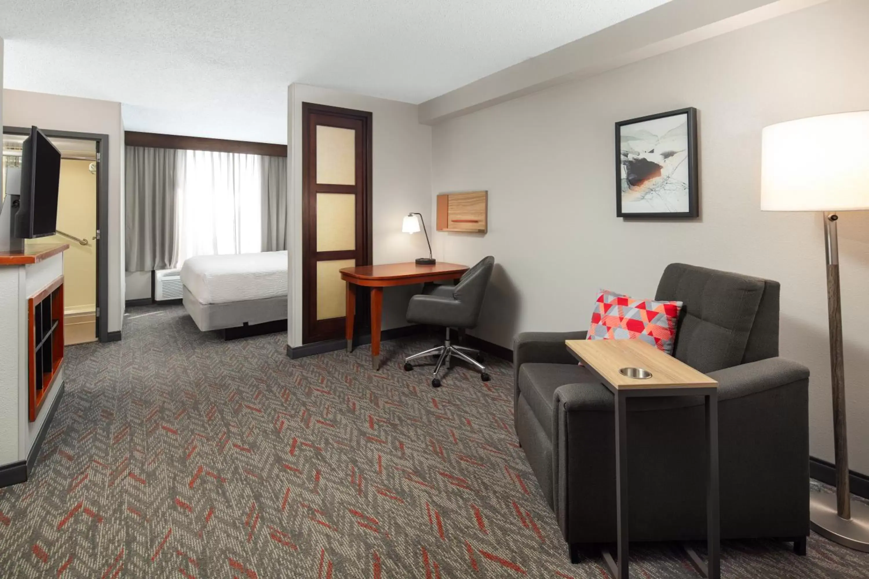 Bed, Seating Area in Candlewood Suites - Birmingham - Inverness, an IHG Hotel
