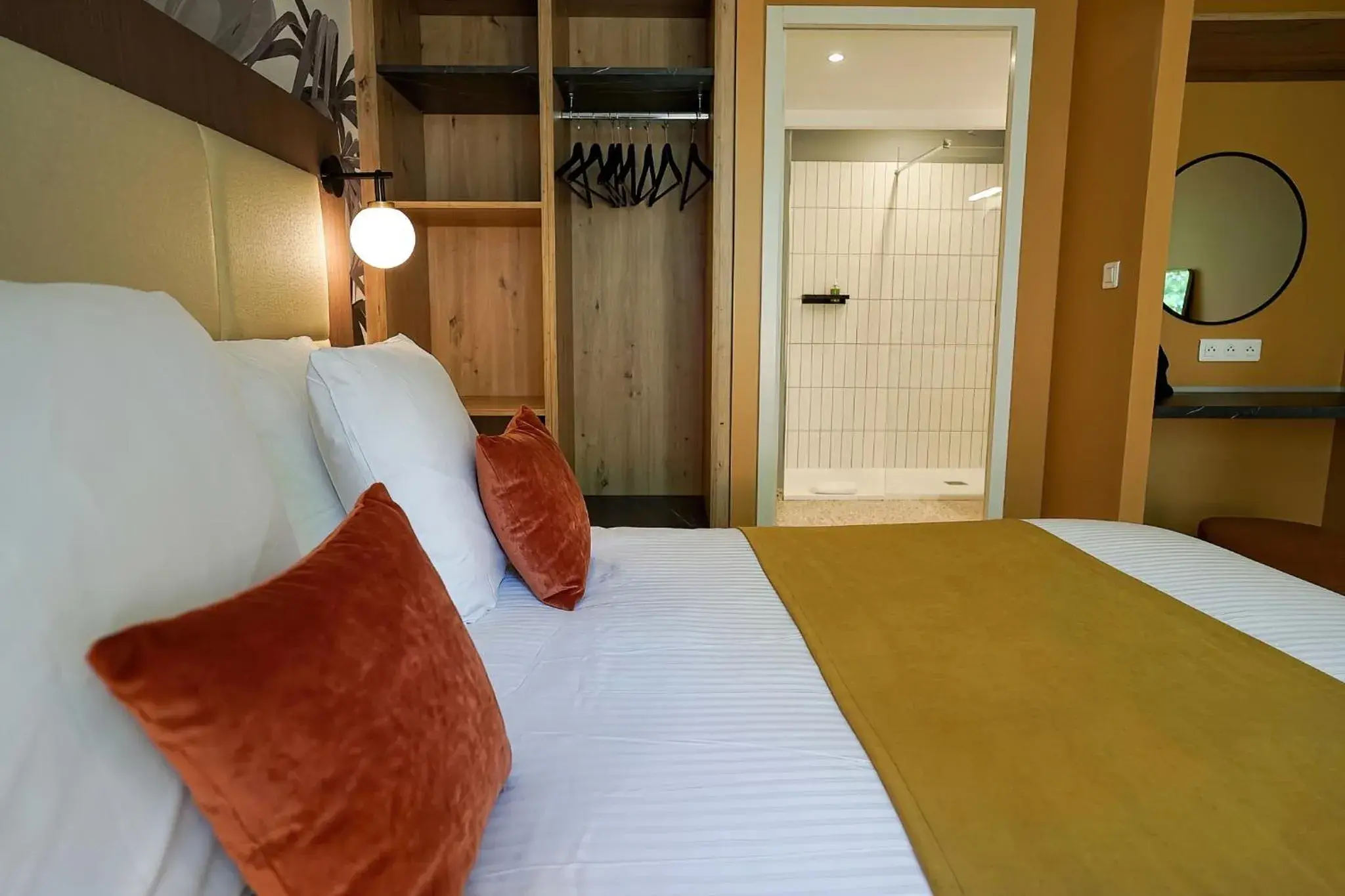 Bed in Quintessia Resort et Spa