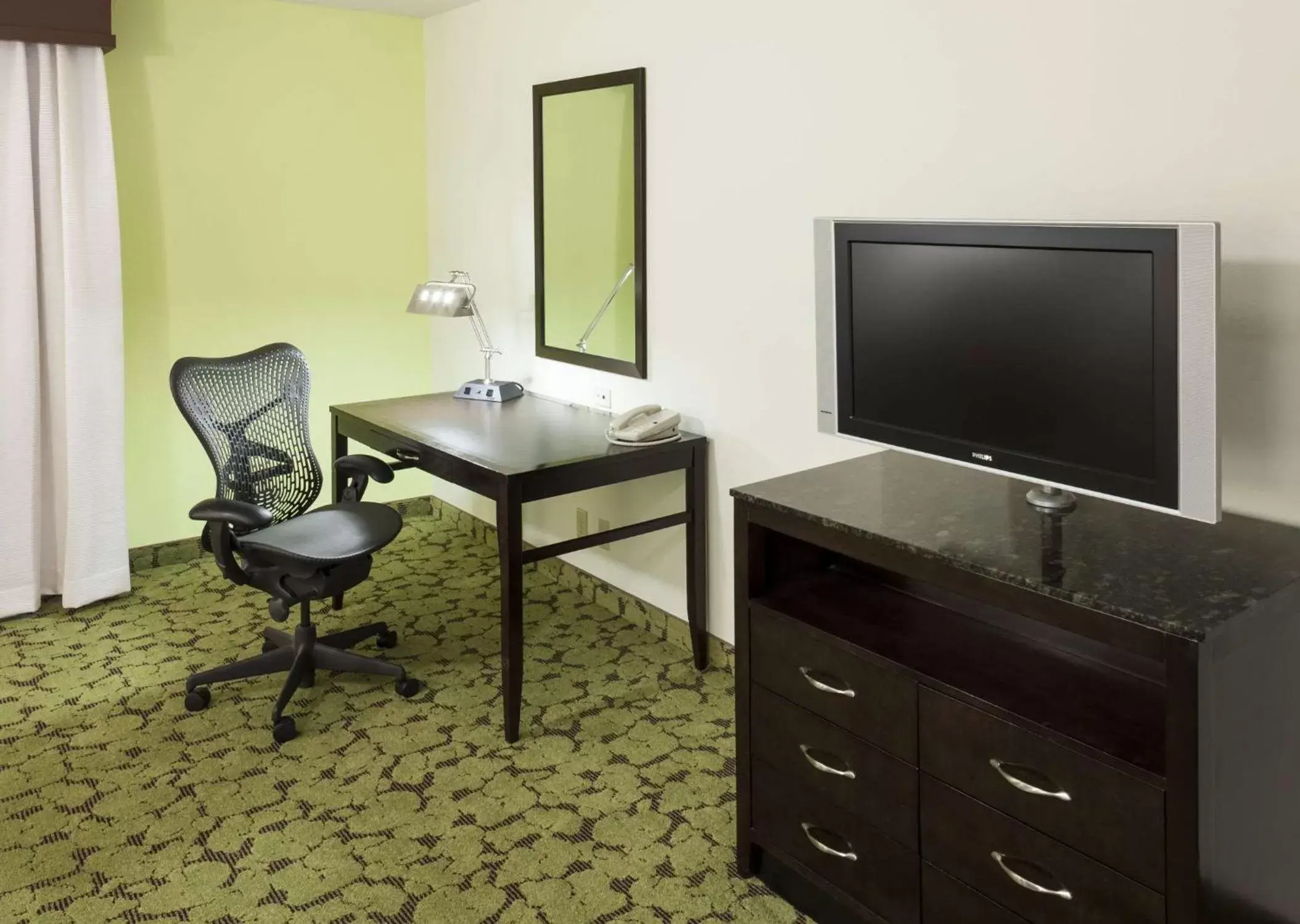 Living room, TV/Entertainment Center in Hilton Garden Inn Dallas Lewisville