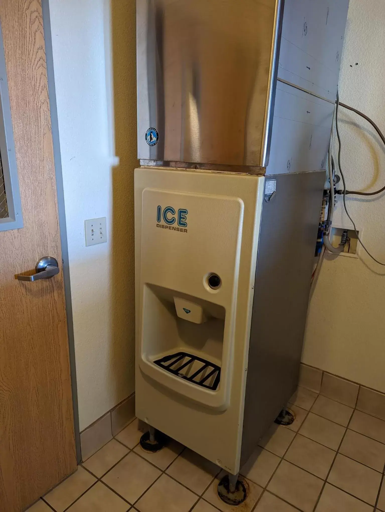 vending machine, Bathroom in Days Inn & Suites by Wyndham Castle Rock