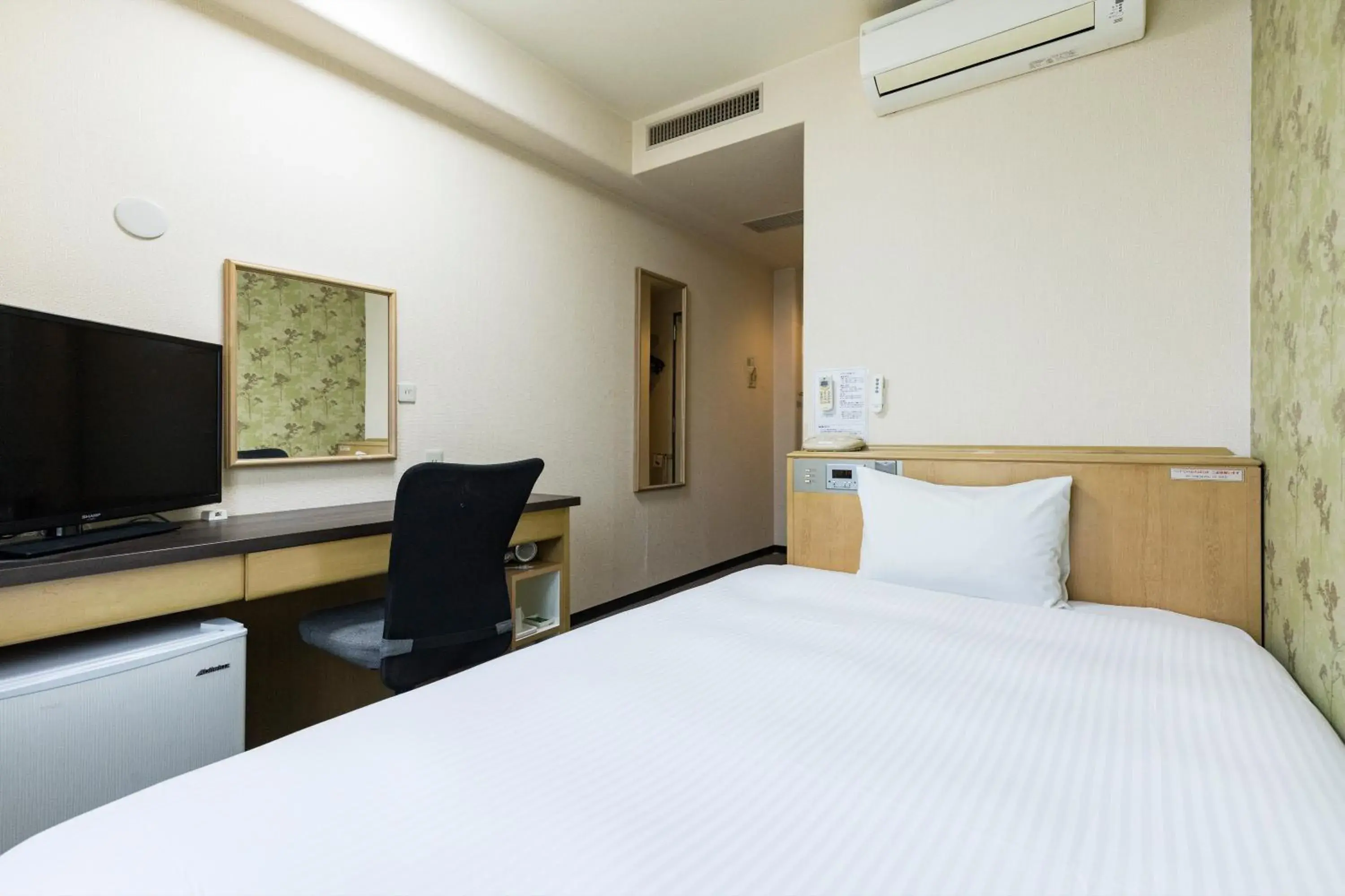 Bed in Hotel Wing International Kumamoto Yatsushiro