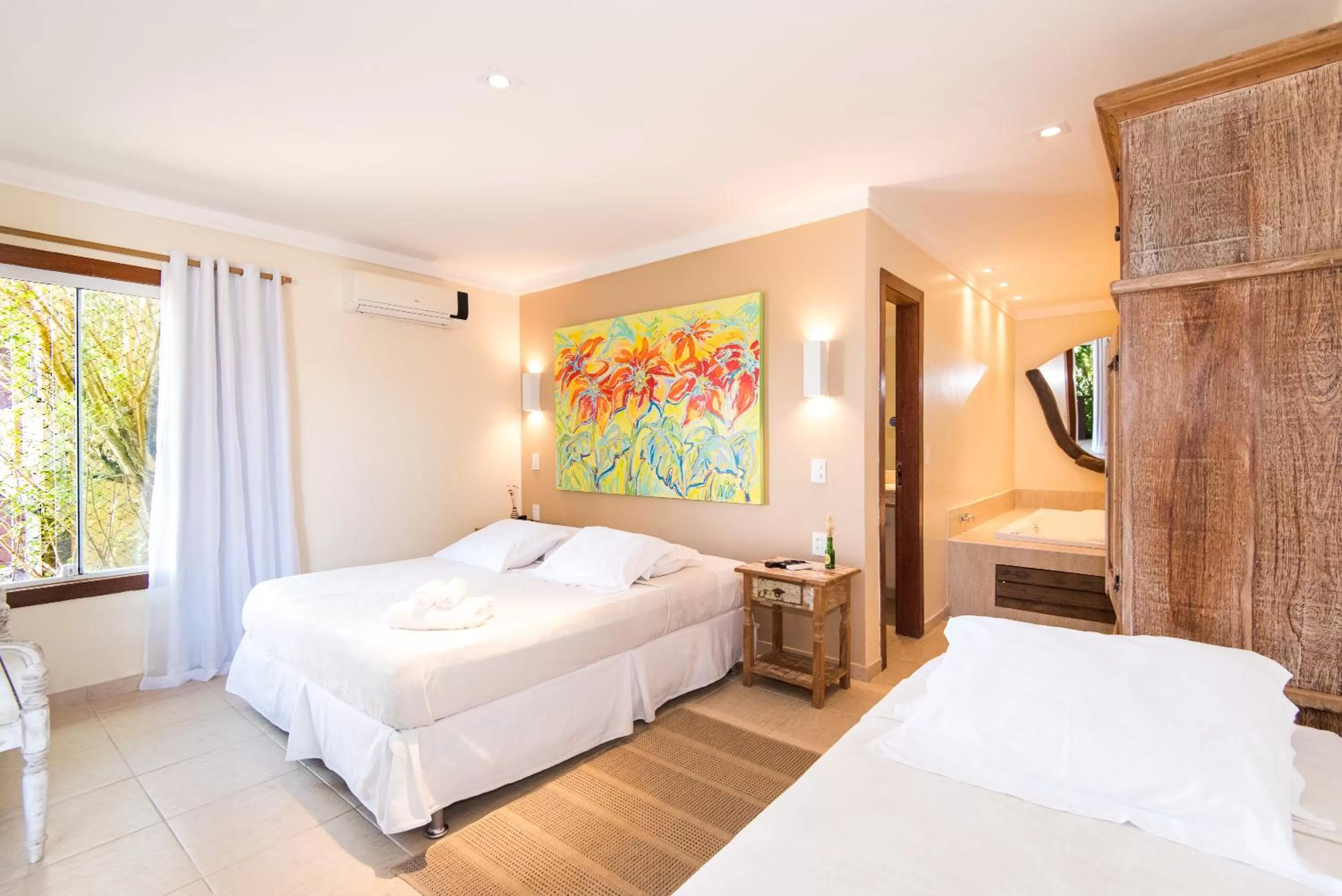 Bed in Pousada La Dolce Vita