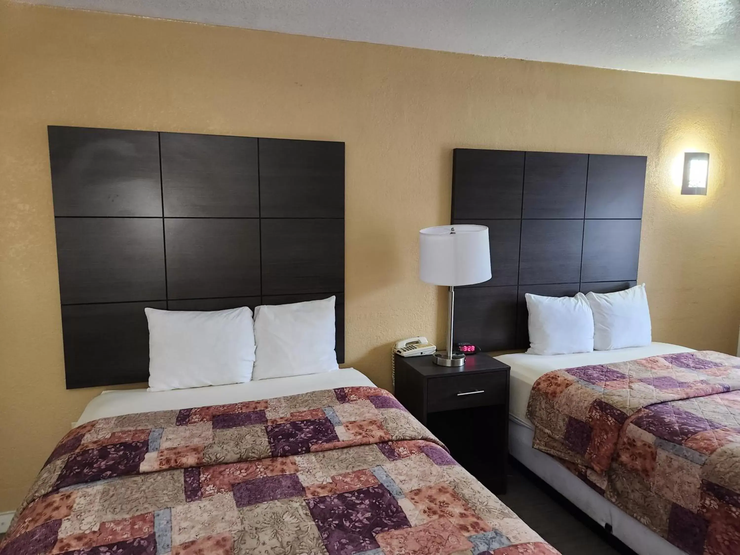 Bed in Days Inn by Wyndham Charlotte Northlake