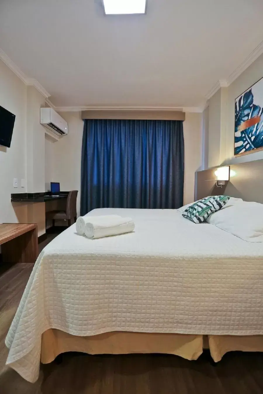 Bed in Sandri City Hotel