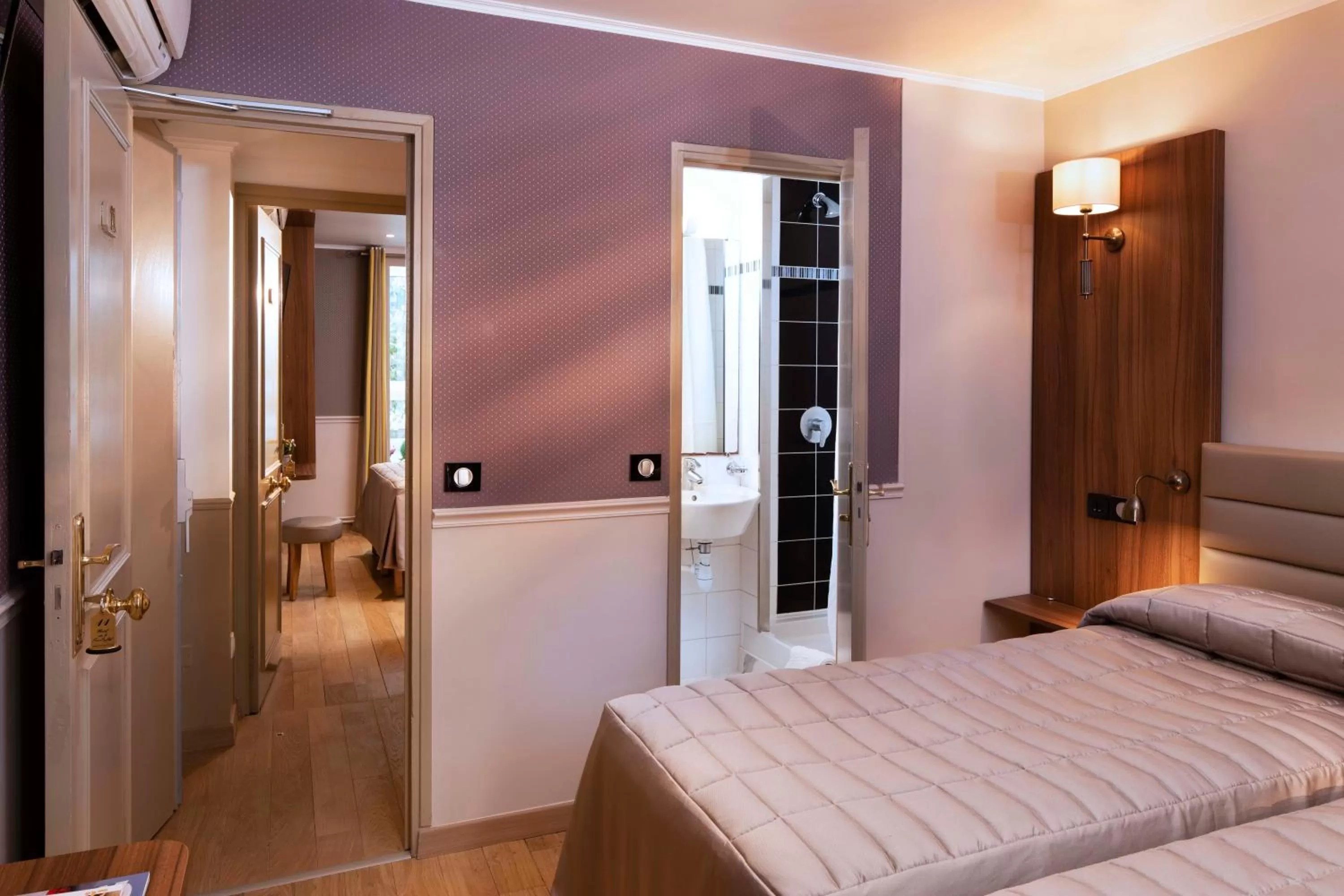 Photo of the whole room, Bed in Hôtel de la Tour Eiffel