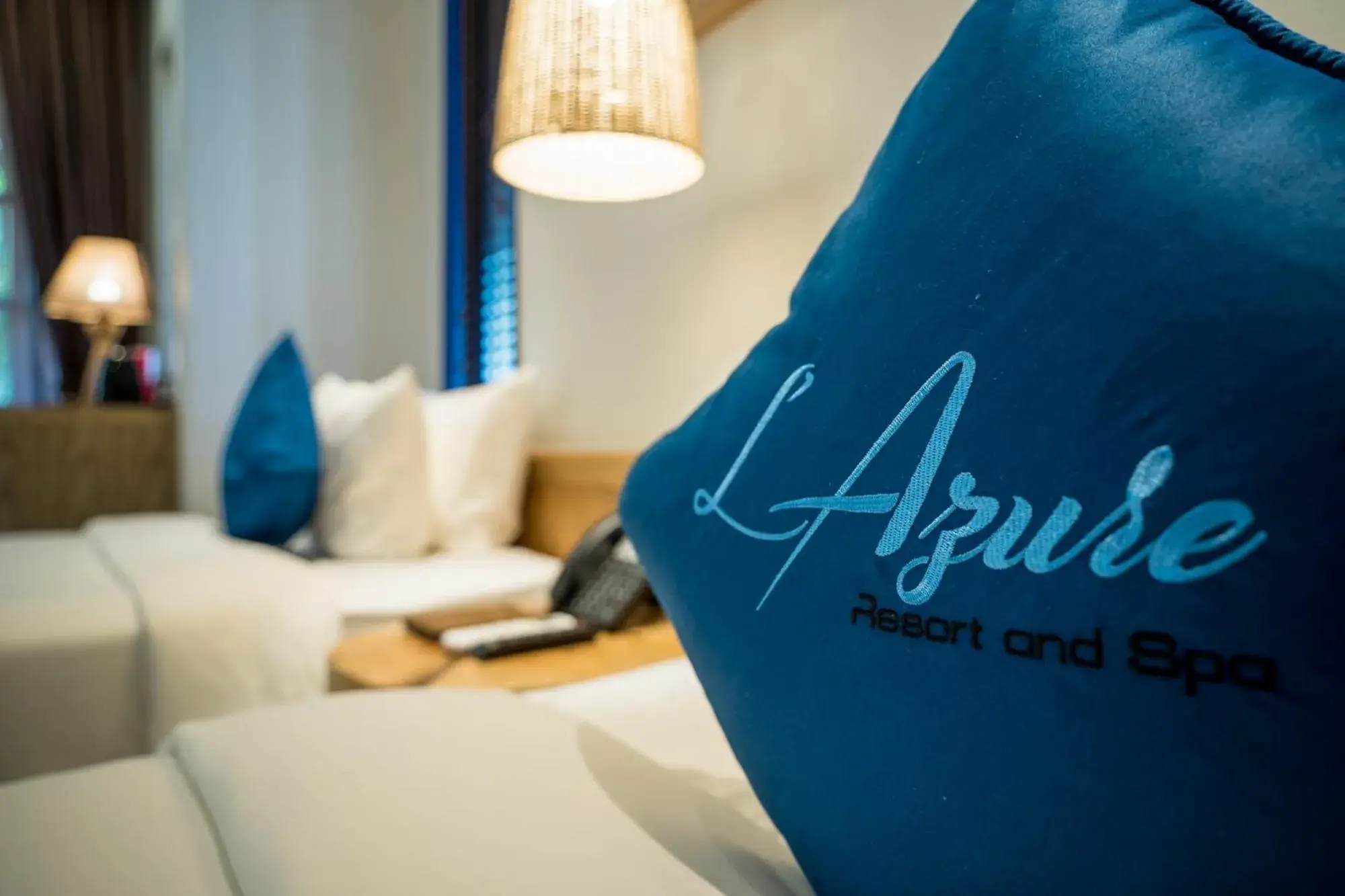 Property logo or sign in L'Azure Resort and Spa