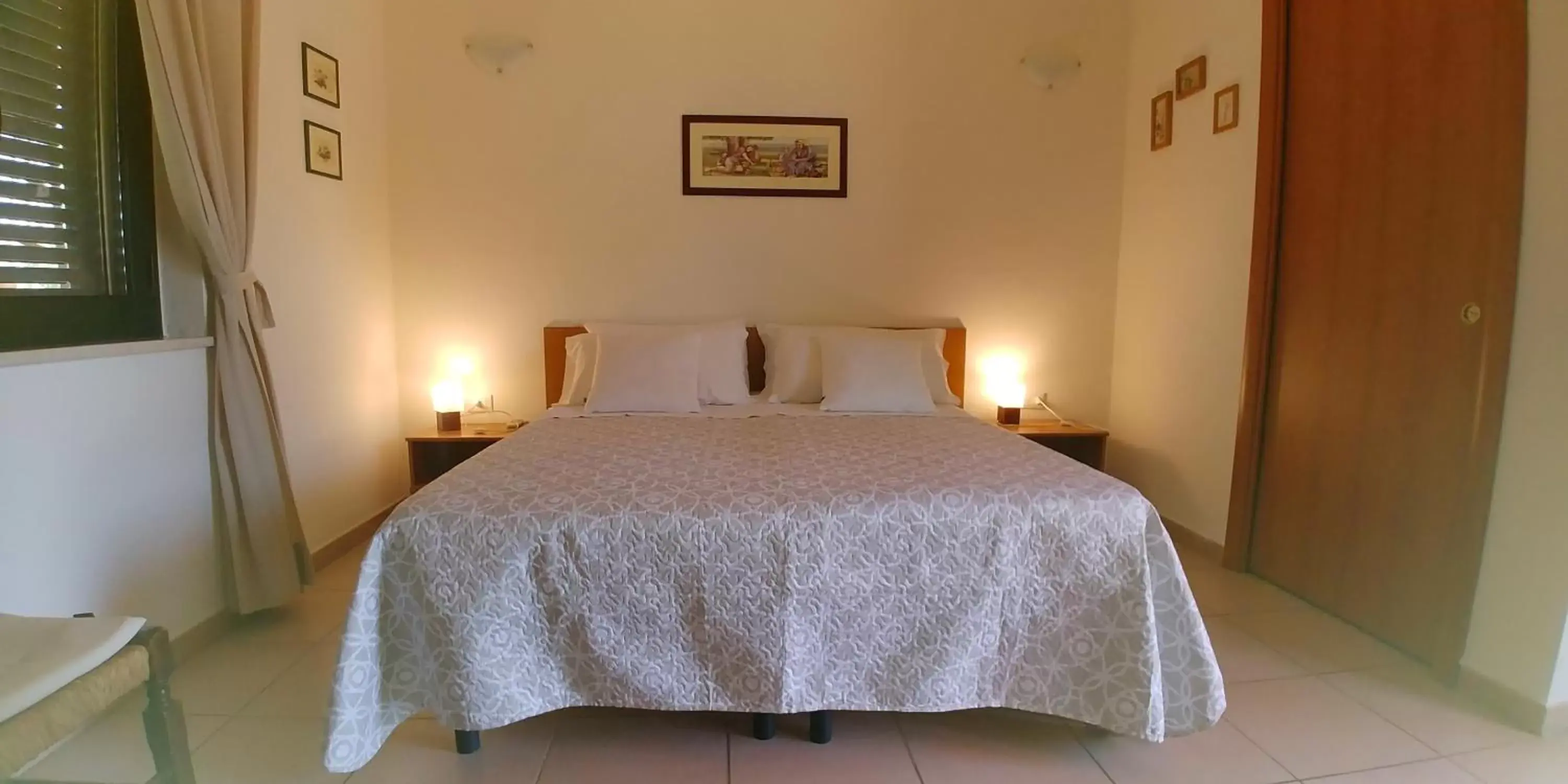 Photo of the whole room, Bed in La Piana degli Ulivi