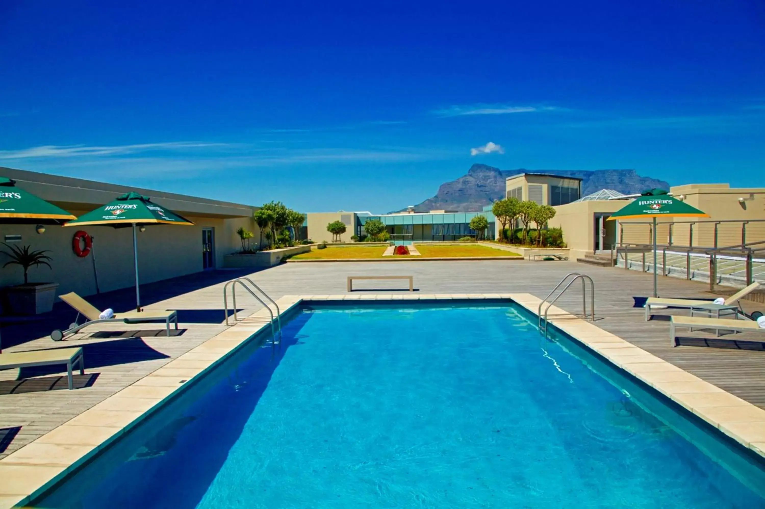 Garden, Swimming Pool in Lagoon Beach Hotel & Spa