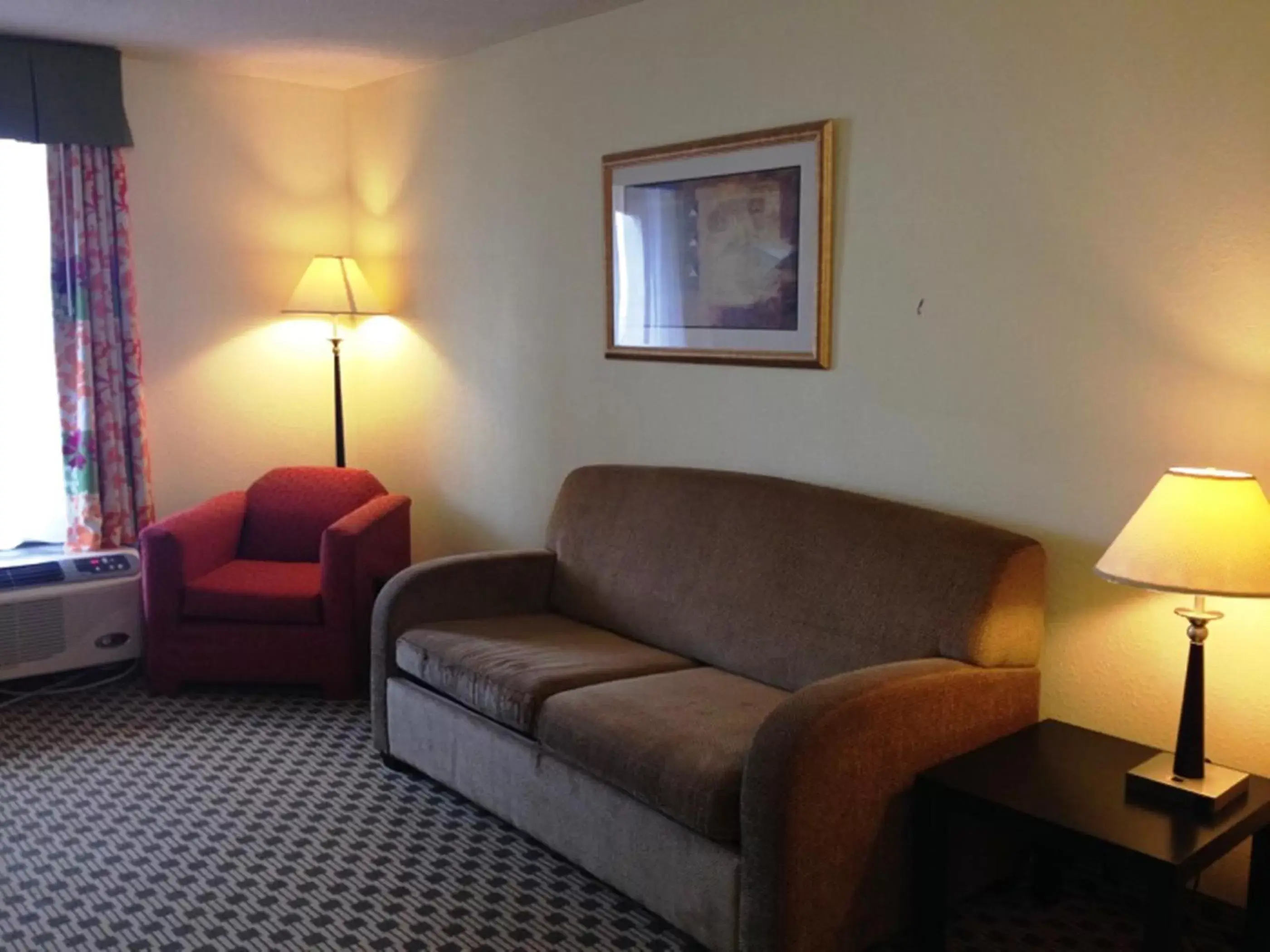 Living room, Seating Area in Days Inn by Wyndham Irving Grapevine DFW Airport North