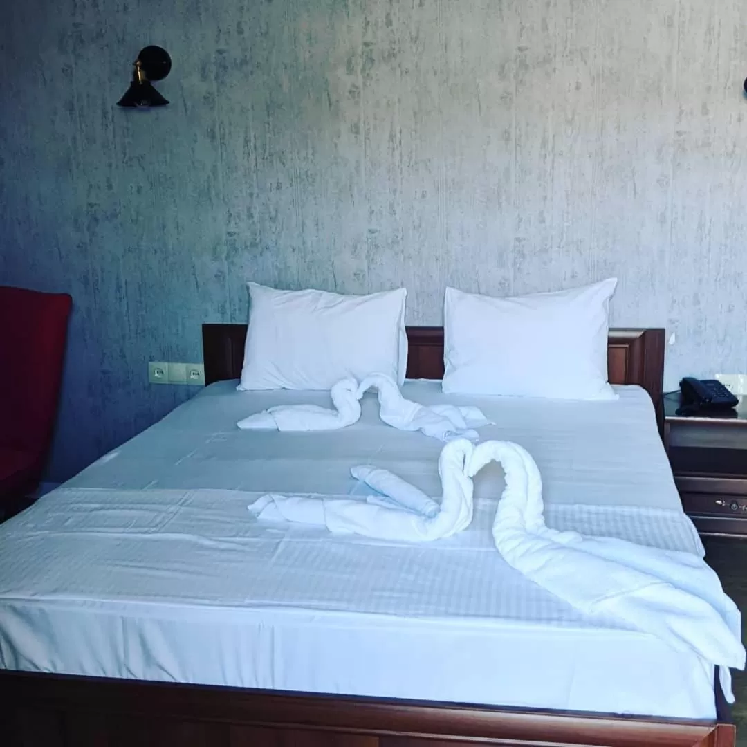 Quadruple Room with Balcony in Hotel Kalanga