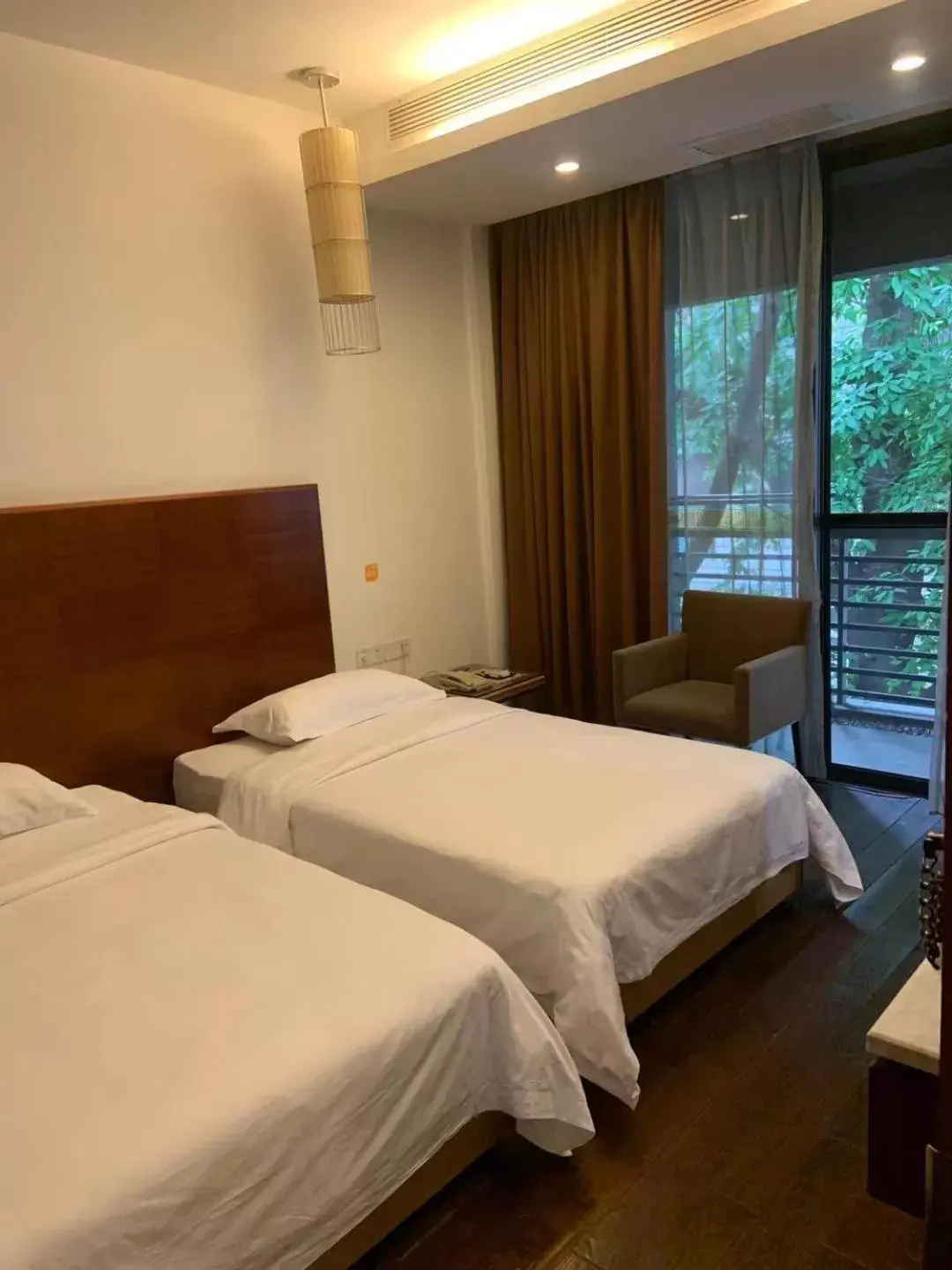 Bed in Guangzhou Fangyuan Hotel
