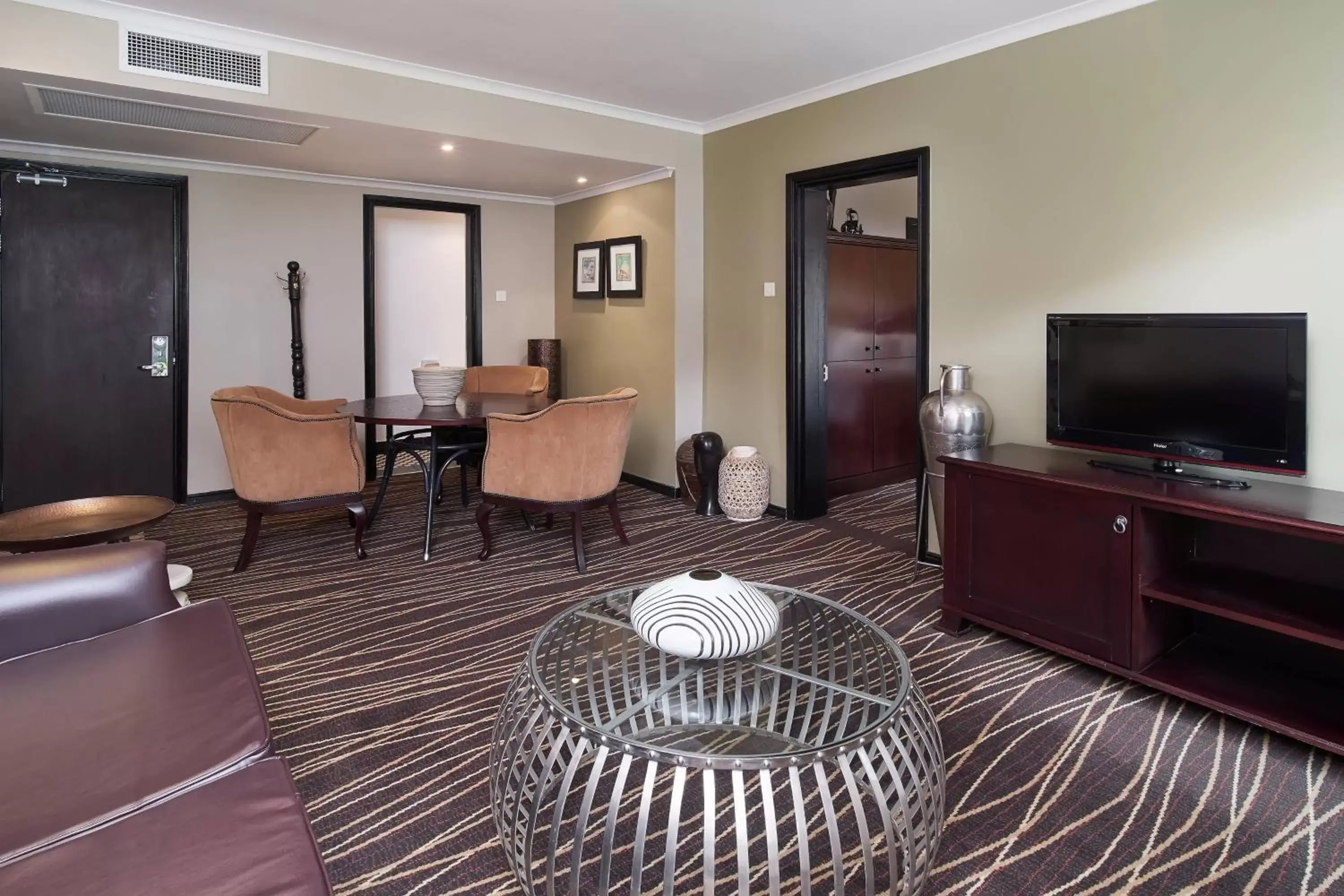 Photo of the whole room, TV/Entertainment Center in Protea Hotel by Marriott Blantyre Ryalls