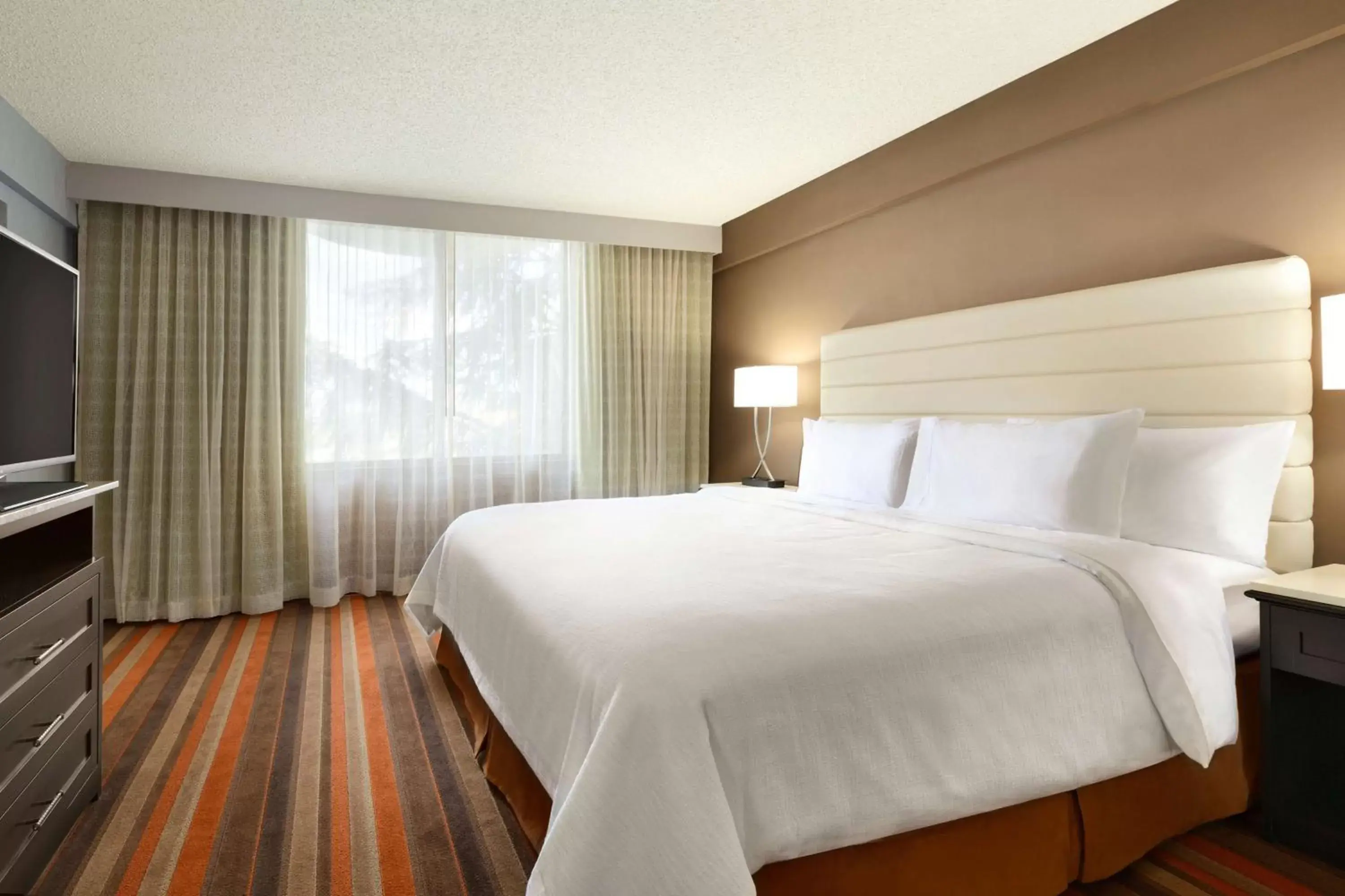 Bed in Embassy Suites by Hilton Oklahoma City Will Rogers Airport