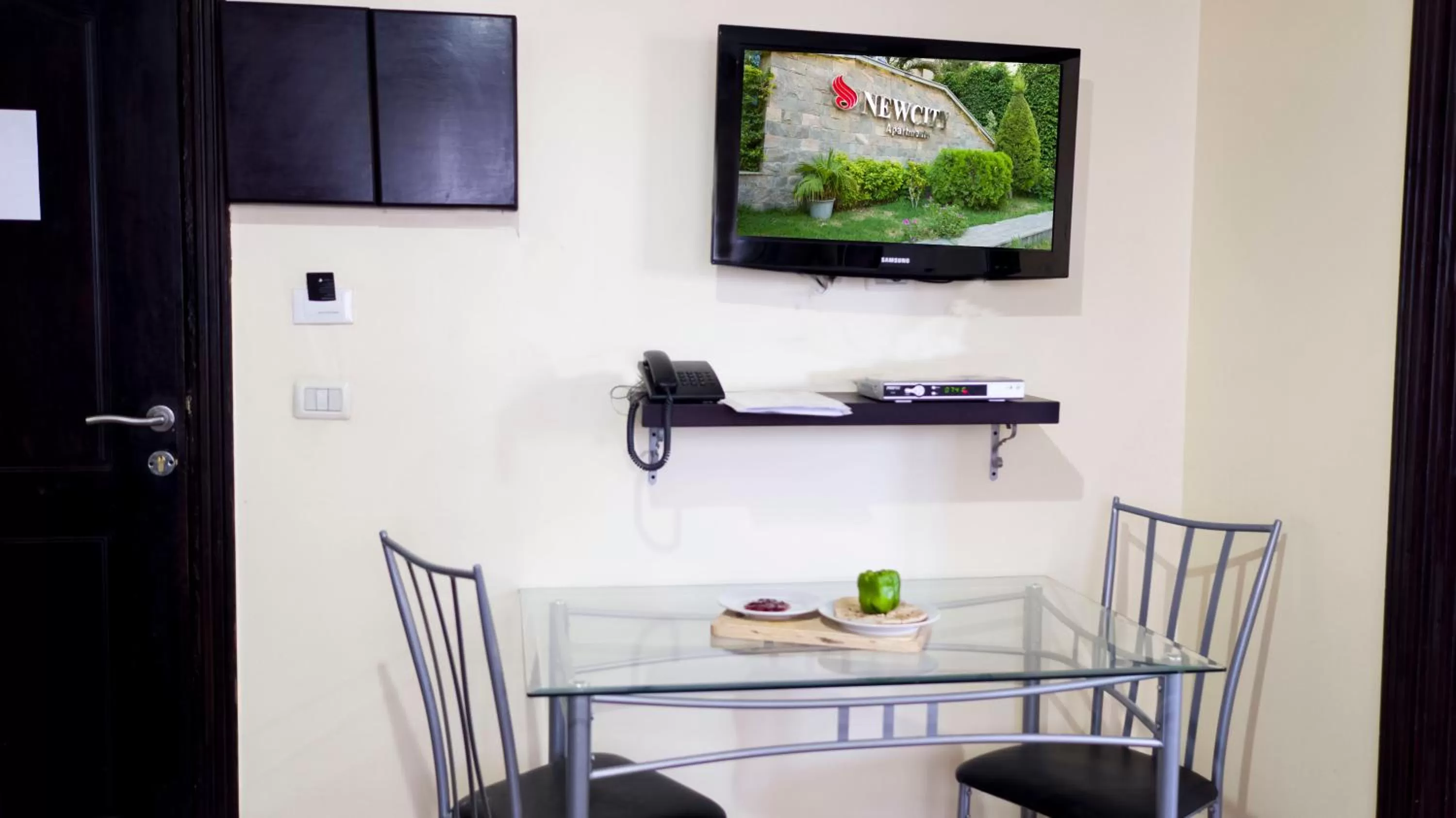 Dining area in NewCity Hotel & Suites