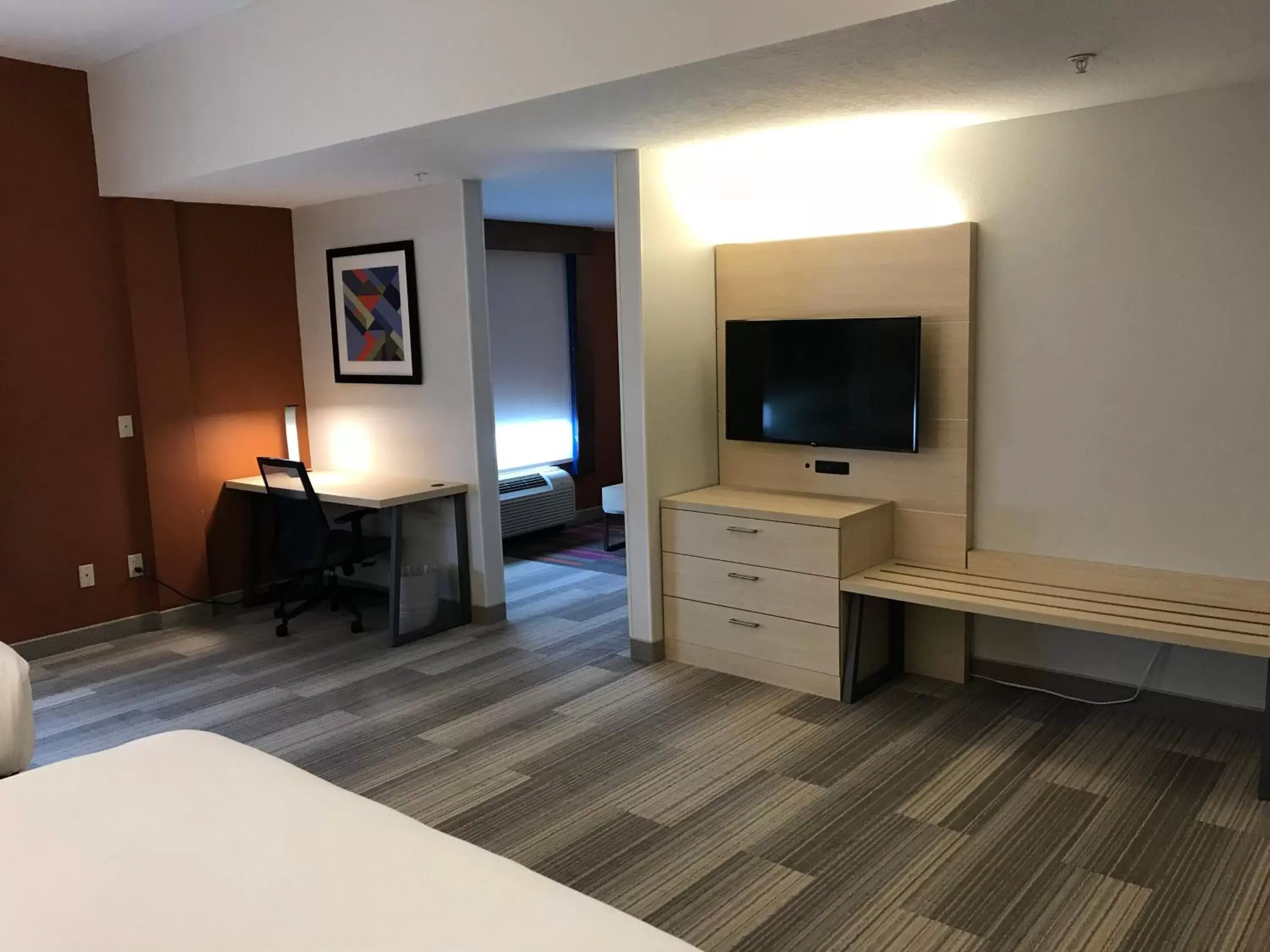 Photo of the whole room, TV/Entertainment Center in Holiday Inn Express Orlando - South Davenport, an IHG Hotel