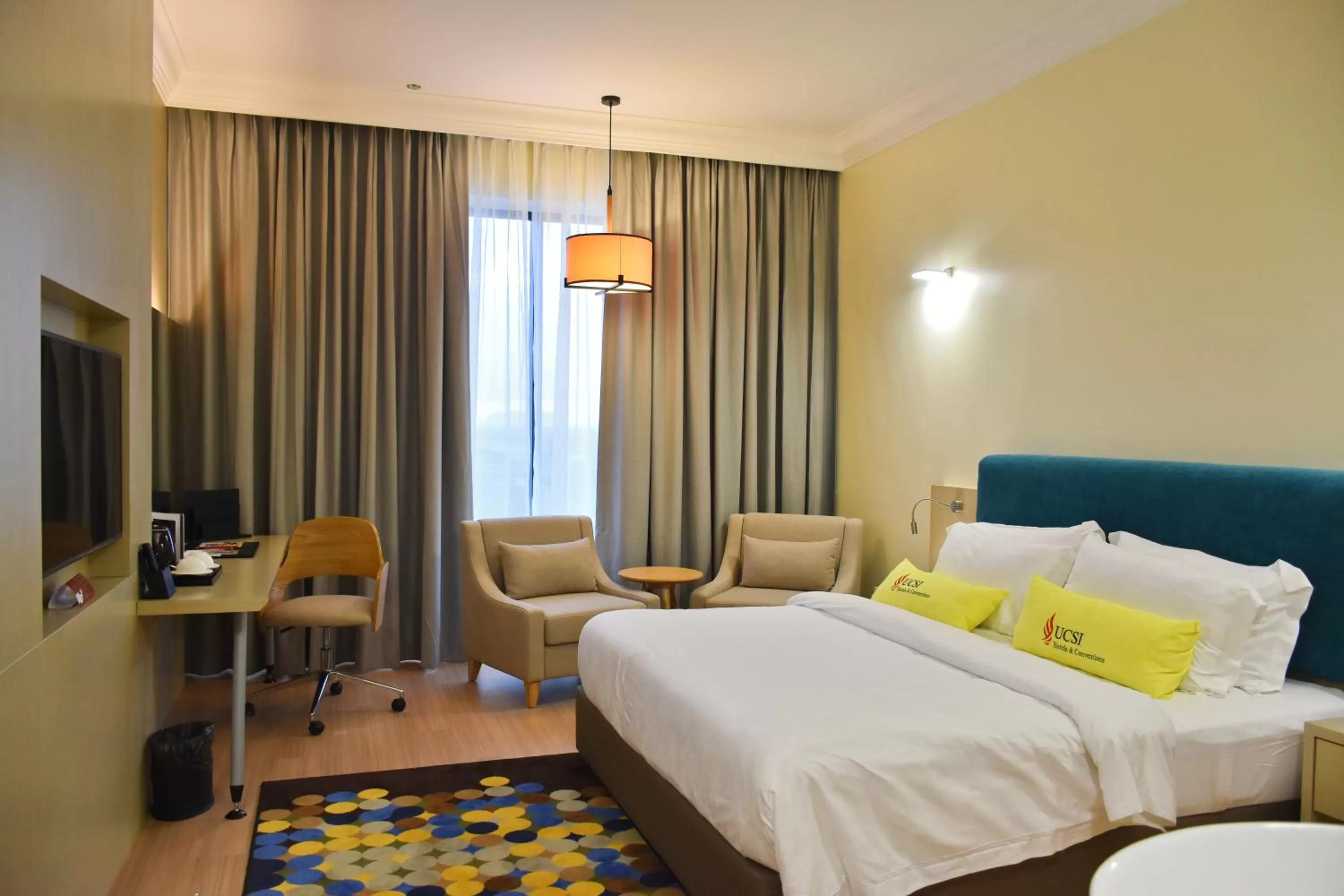 Photo of the whole room, Bed in UCSI Hotel Kuching