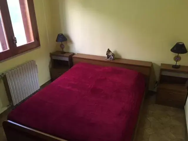 Bed in Stanza in Villa con giardino vista mare