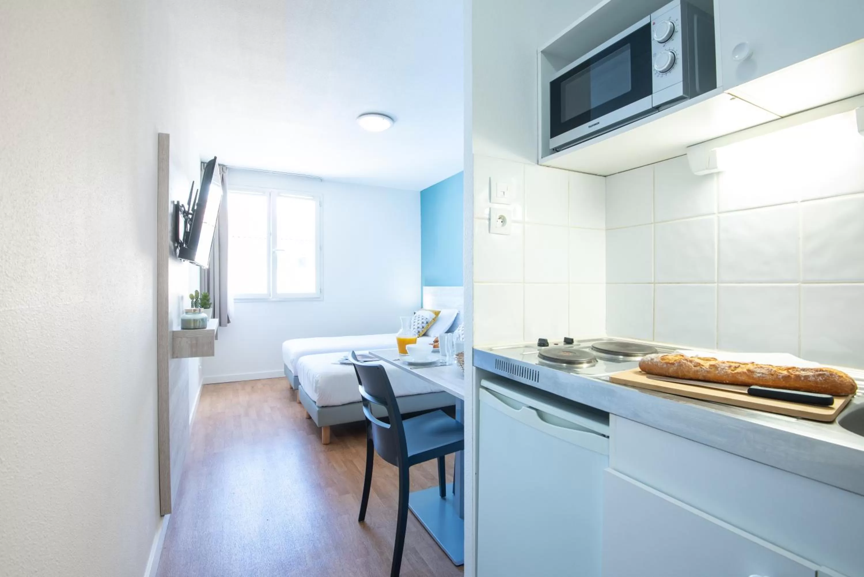 Kitchen or kitchenette in Comfort Aparthotel Aix Le Tholonet