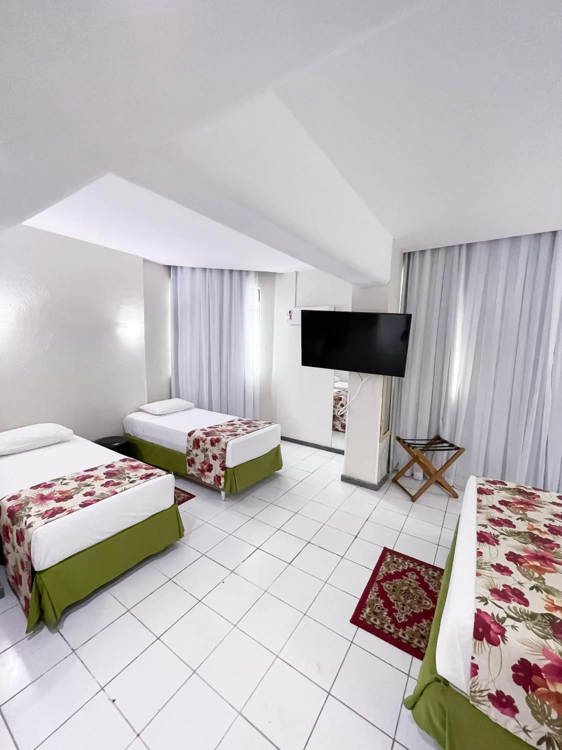 Bedroom, TV/Entertainment Center in Golden Park Recife Boa Viagem