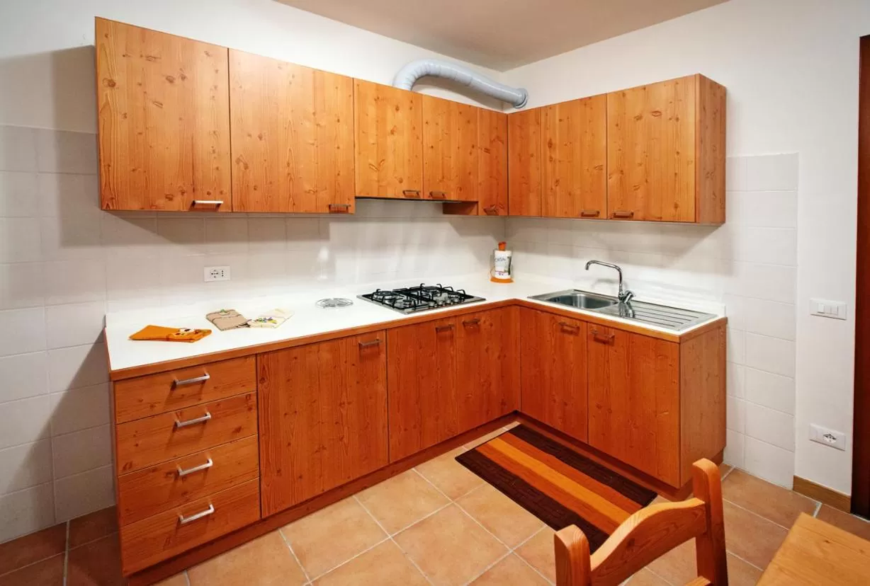 Kitchen or kitchenette in Albergo Diffuso Tolmezzo