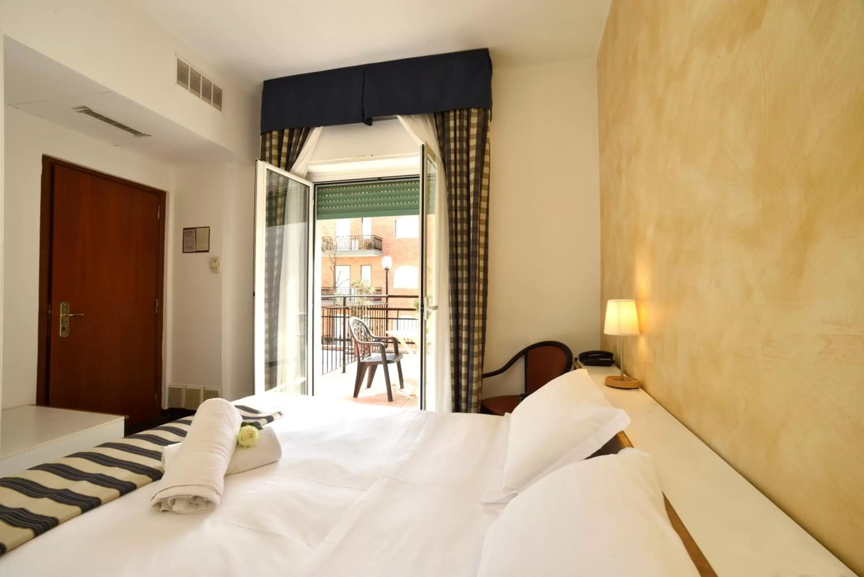 Photo of the whole room, Bed in Hotel Morchio Mhotelsgroup