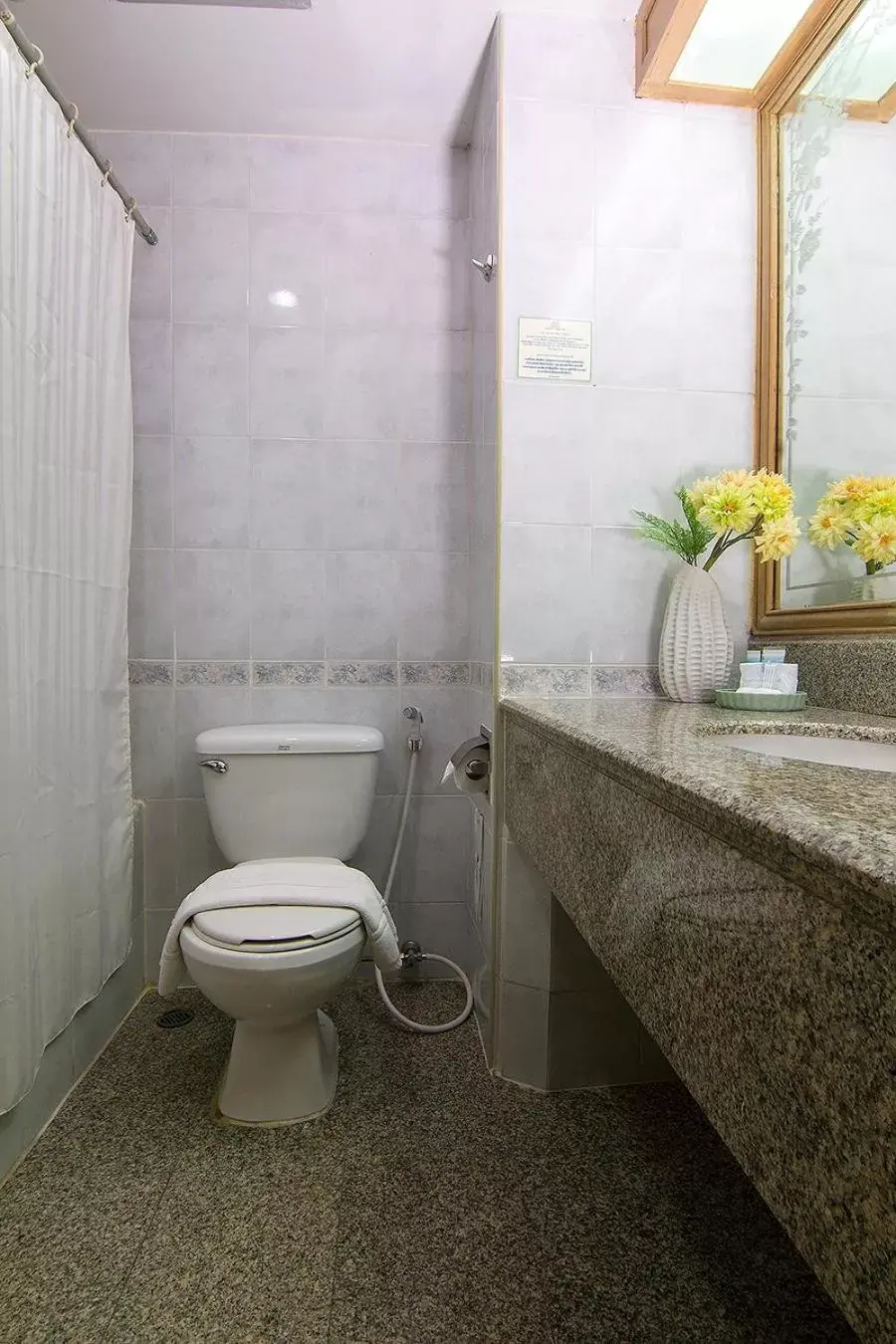 Bathroom in Bossotel Chiang Mai - SHA Plus
