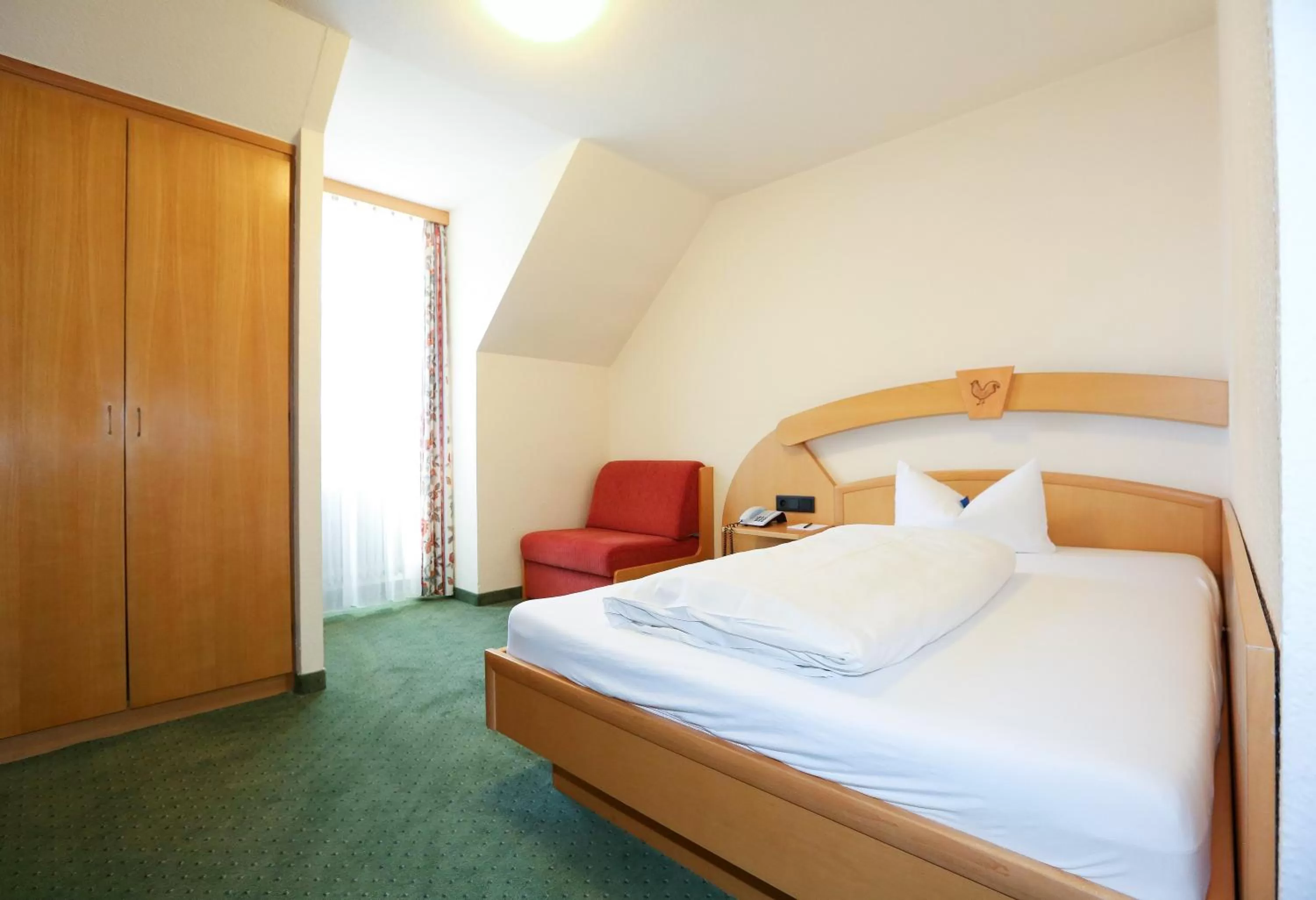 Bed in Arthotel ANA Goggl