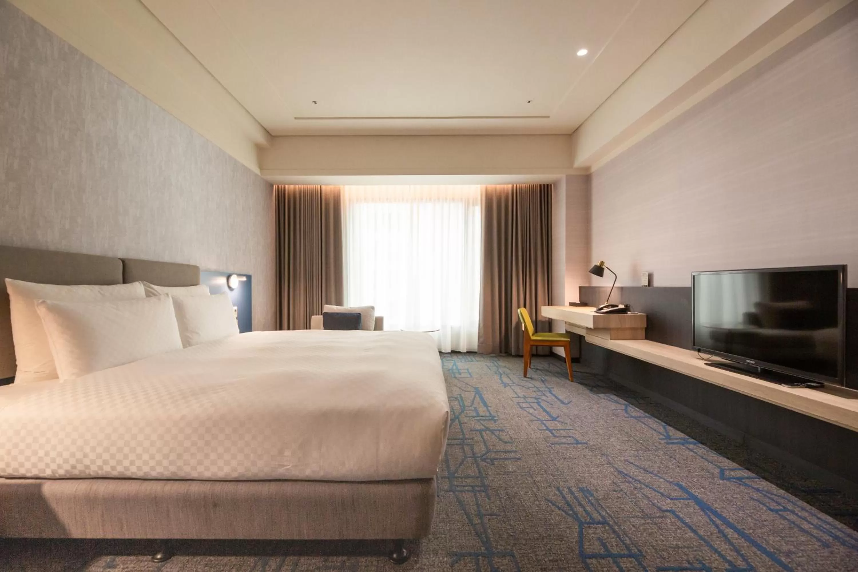 Photo of the whole room, Bed in Miramar Garden Taipei