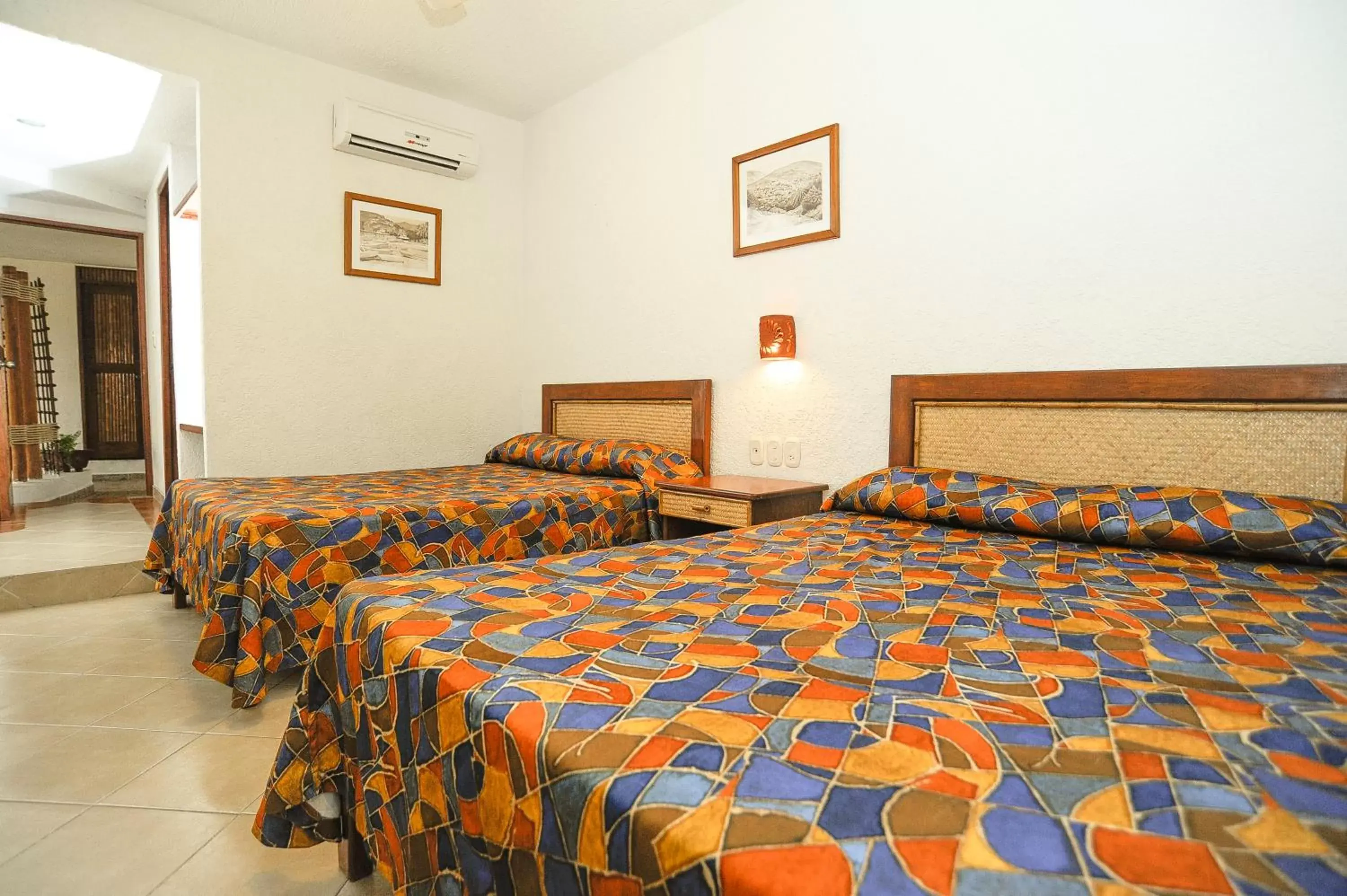 Bed in Hotel Suites Ixtapa Plaza