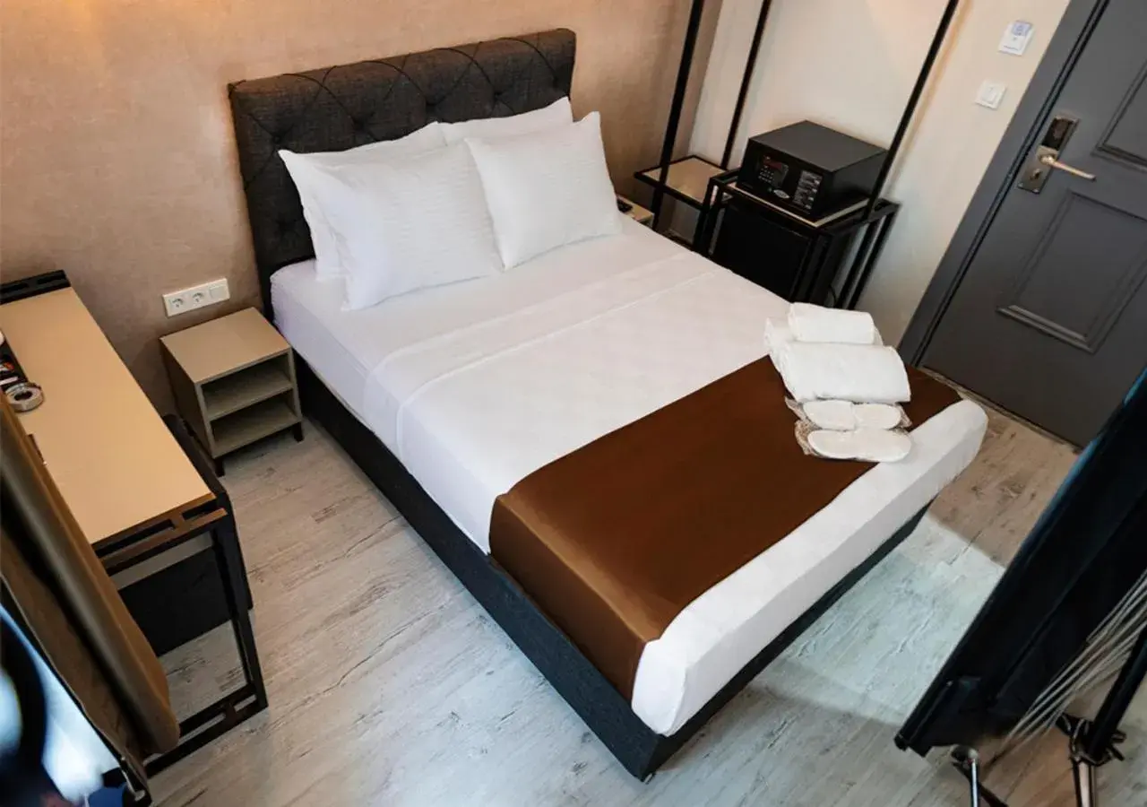 Bed in MONEZZA HOTEL MALTEPE