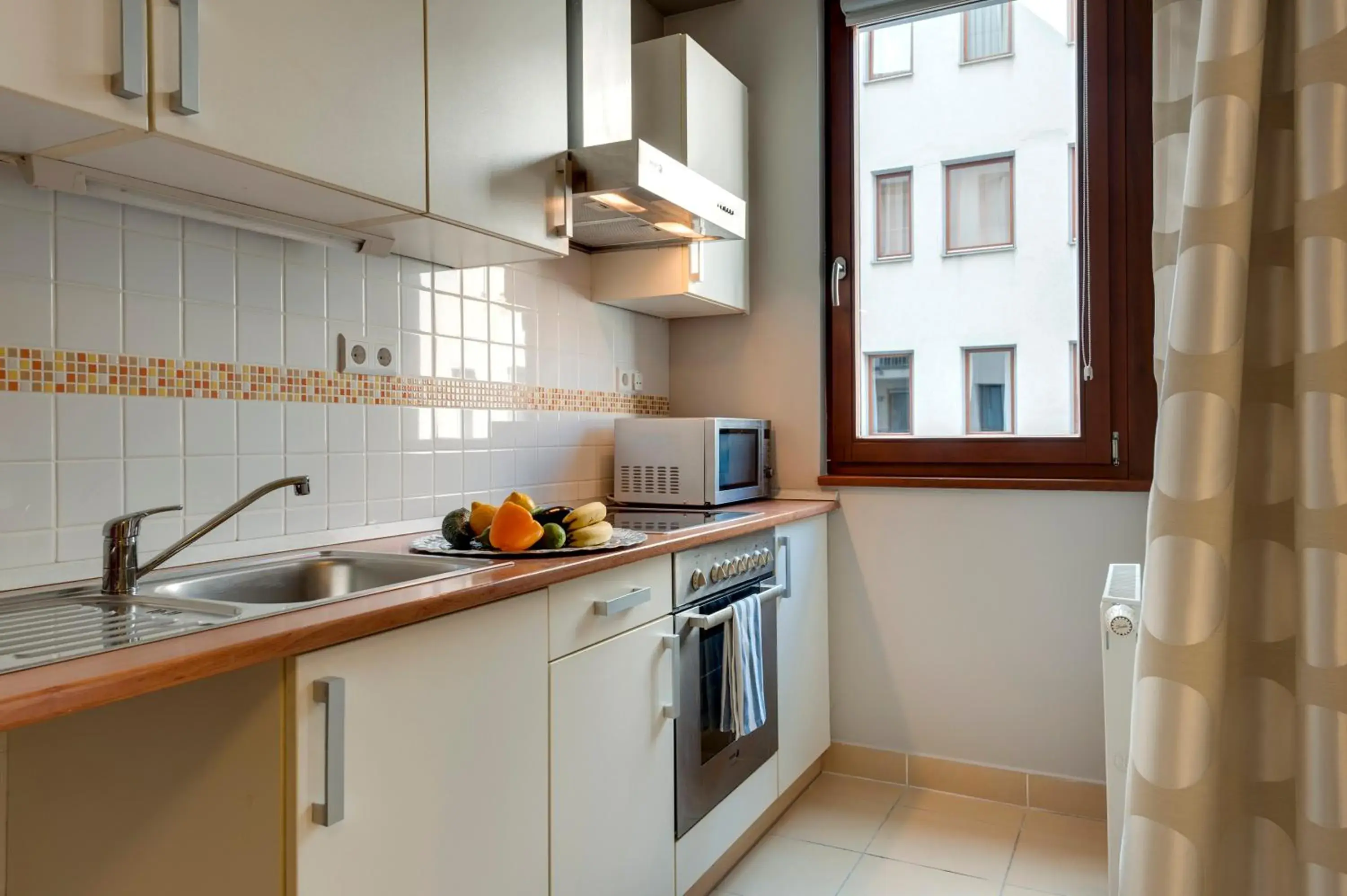 kitchen, Kitchen/Kitchenette in Central Passage Budapest Apartments