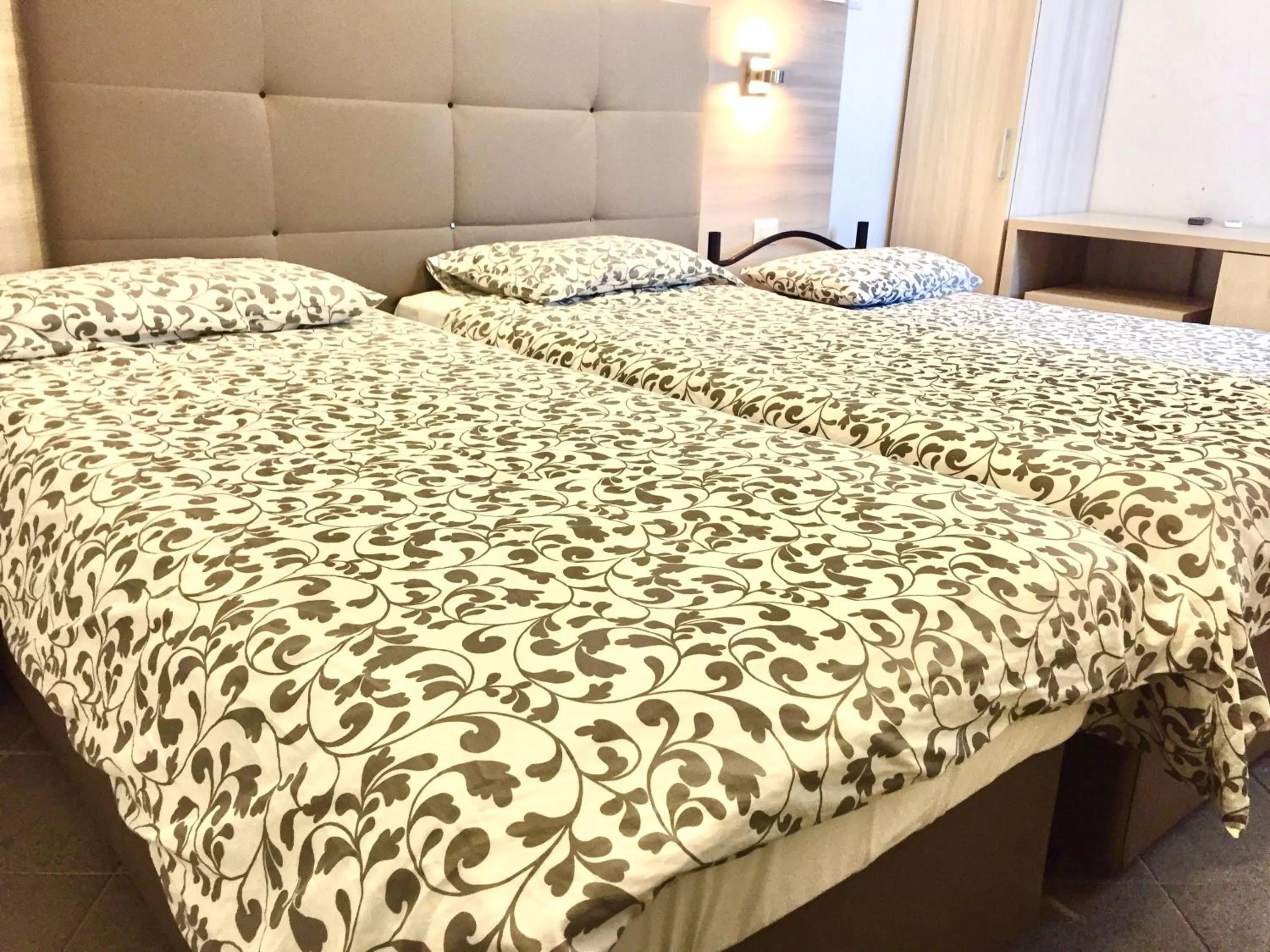 Bed in Academy Hotel