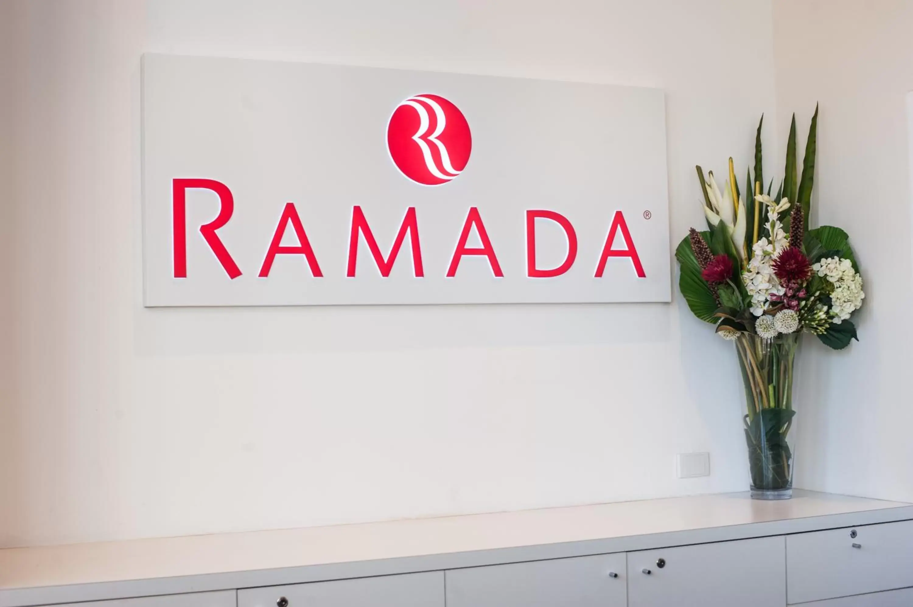 Property logo or sign in Ramada Hotel & Suites by Wyndham Cabramatta