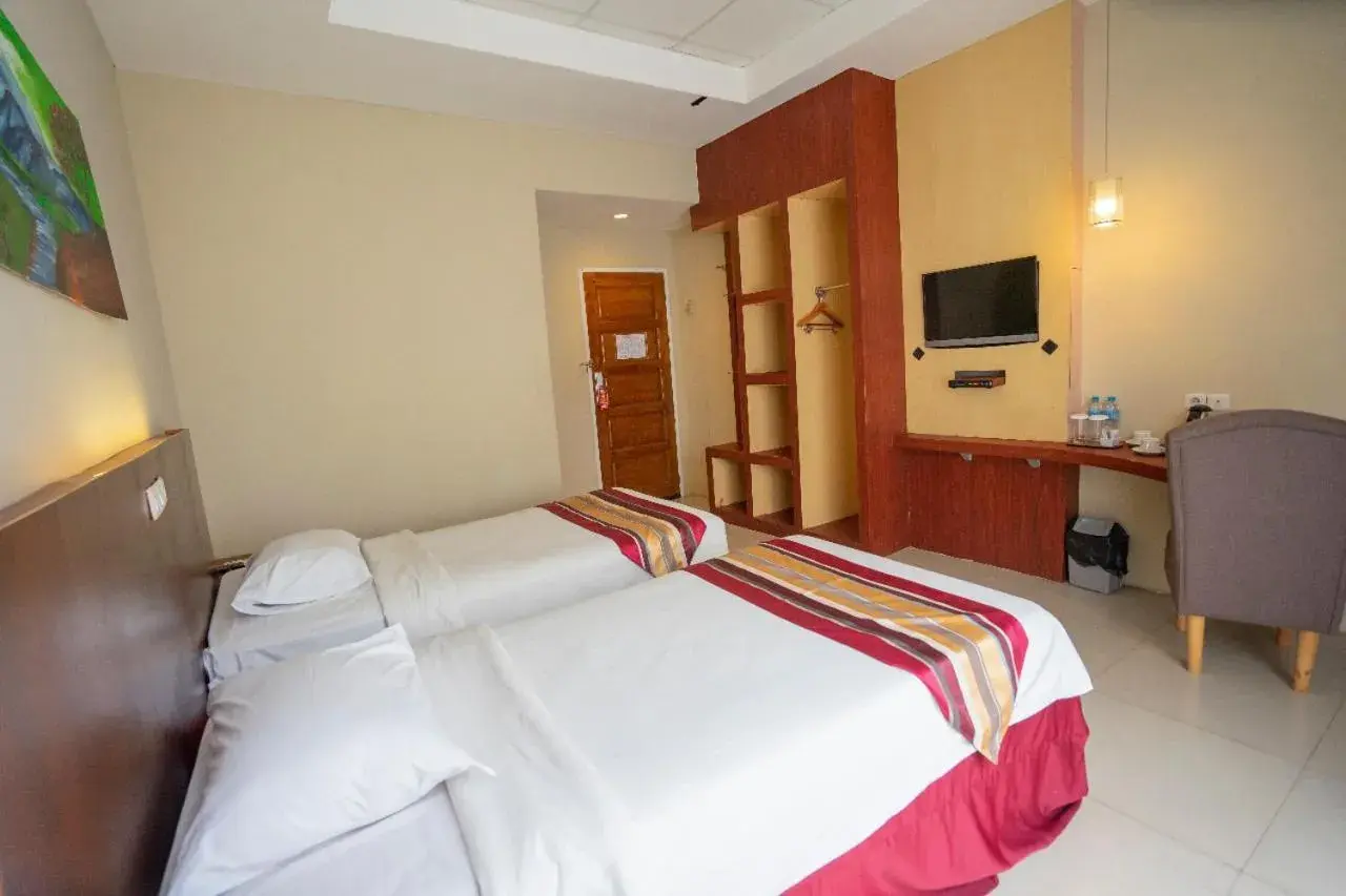 Bed in Bangka City Hotel
