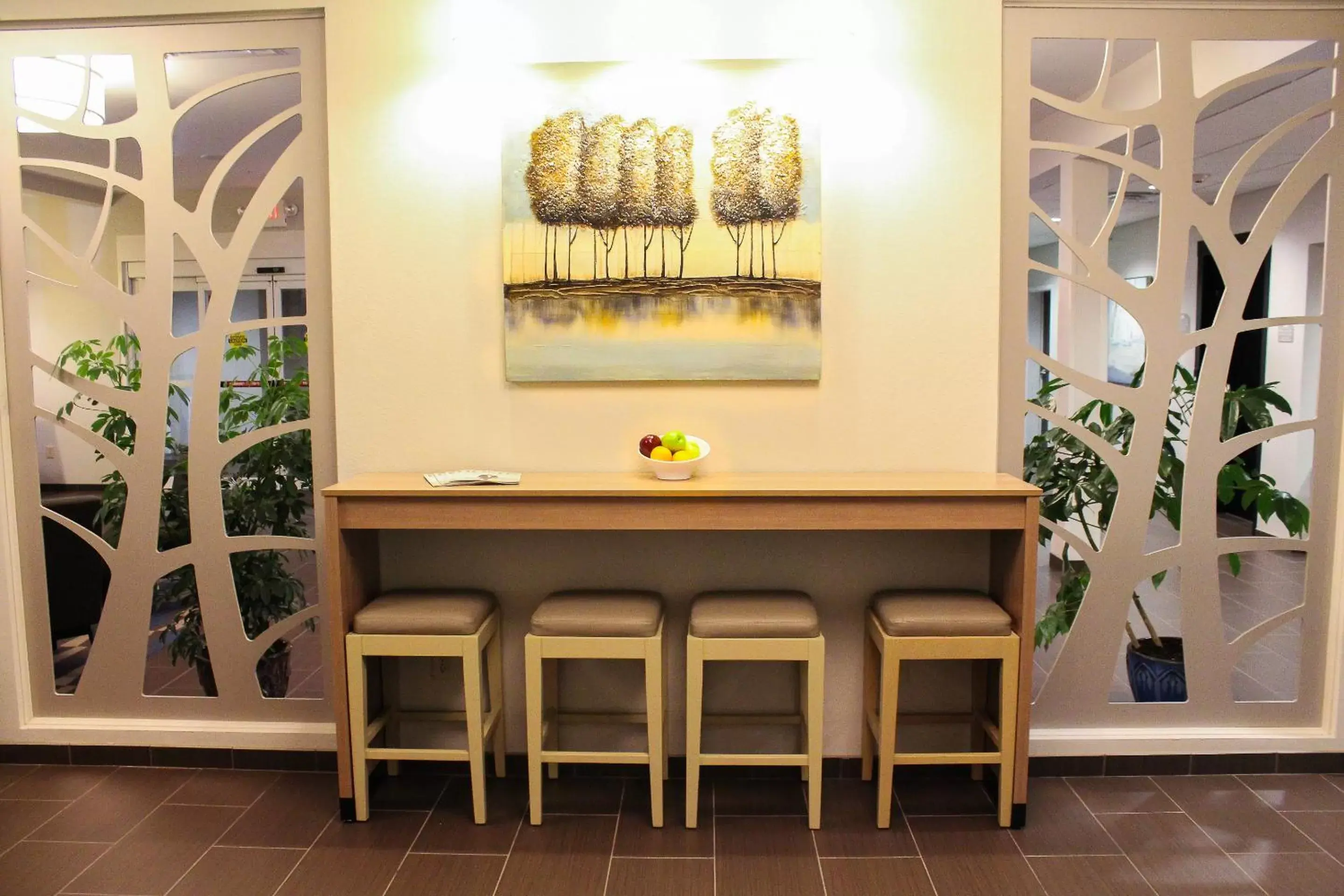 Communal lounge/ TV room, Lobby/Reception in Microtel Inn & Suites by Wyndham - Penn Yan