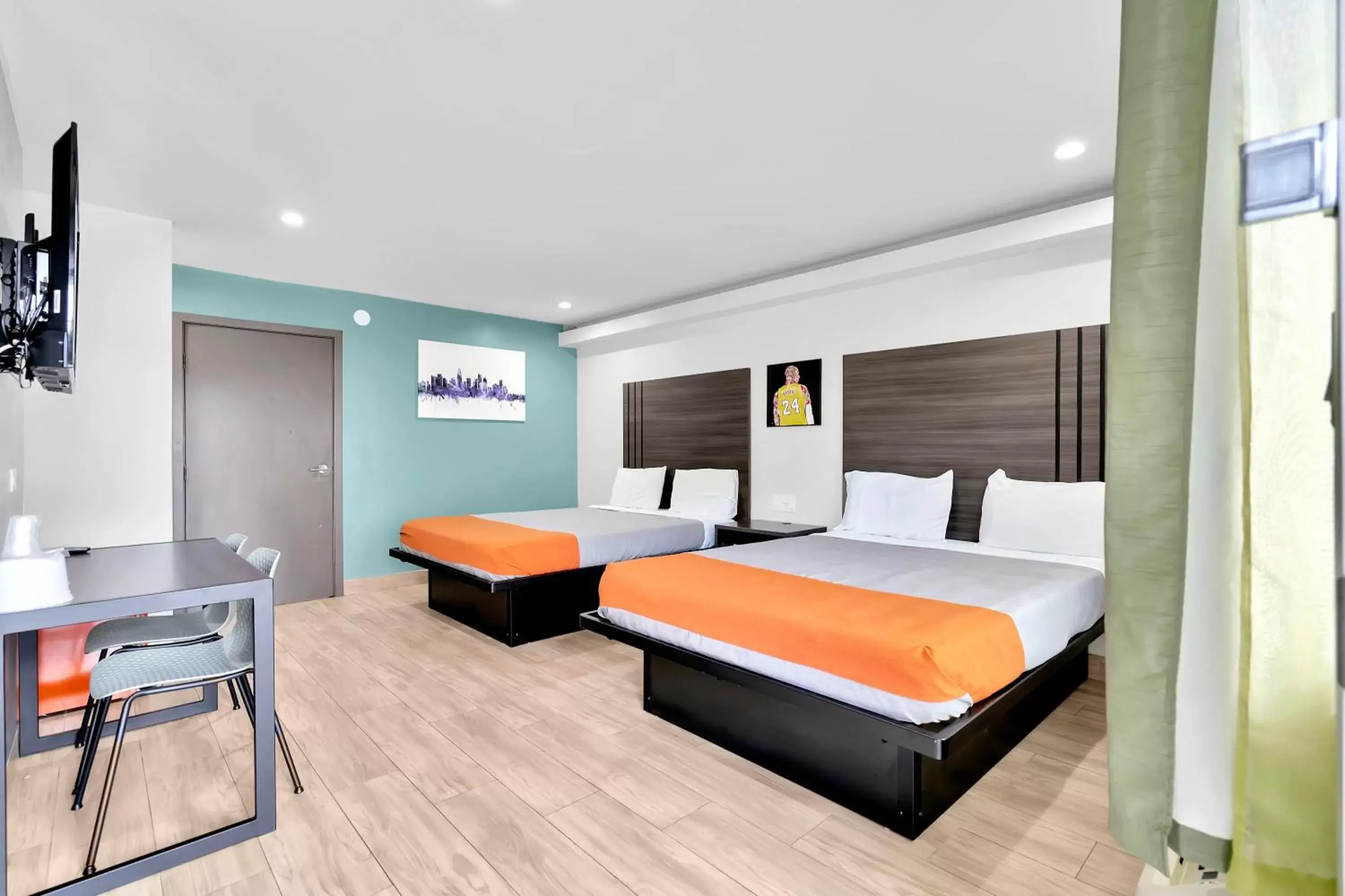 Bed in Exclusivo Inn and Suites