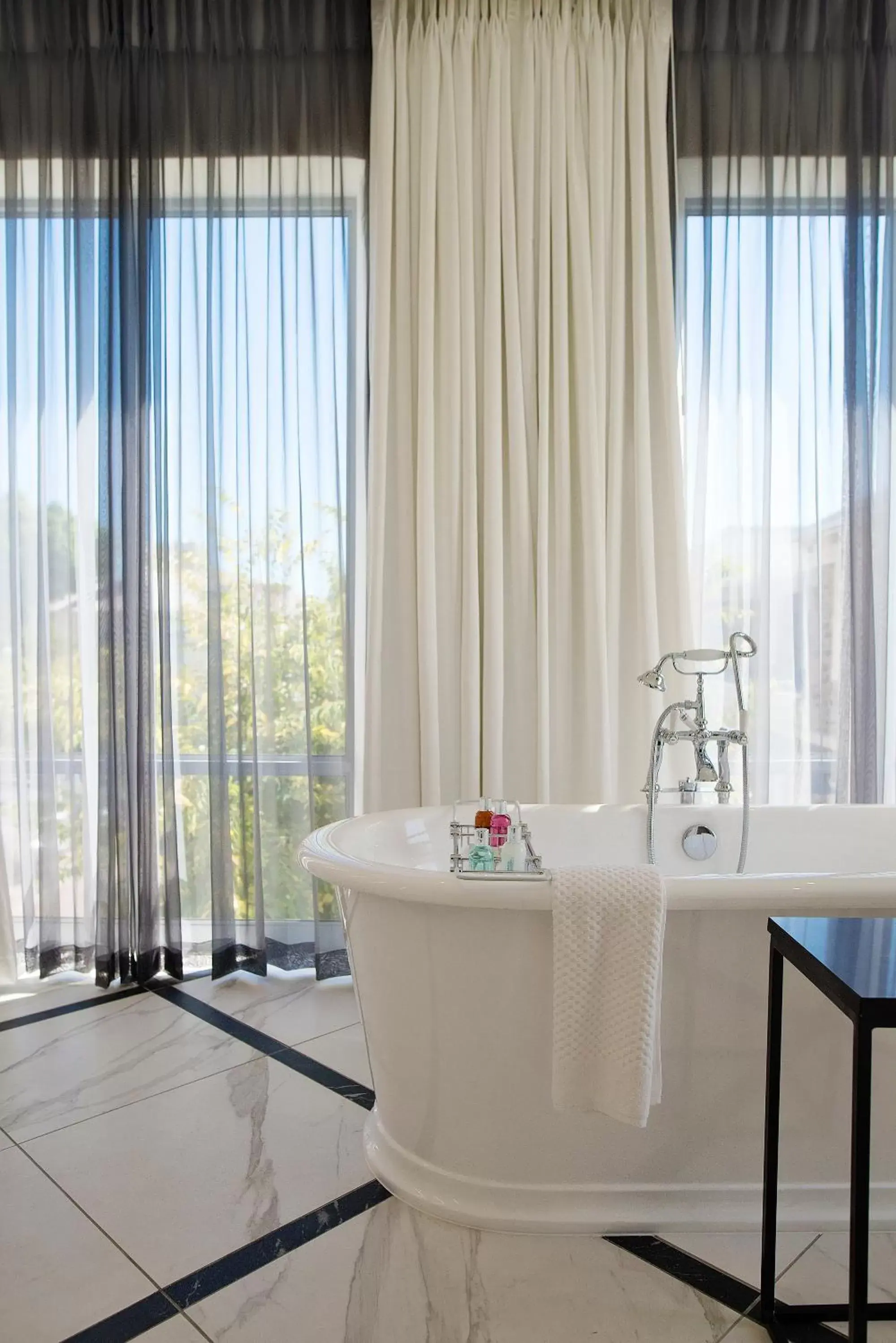 Bathroom in The Manor House at the Queen Victoria Hotel by NEWMARK