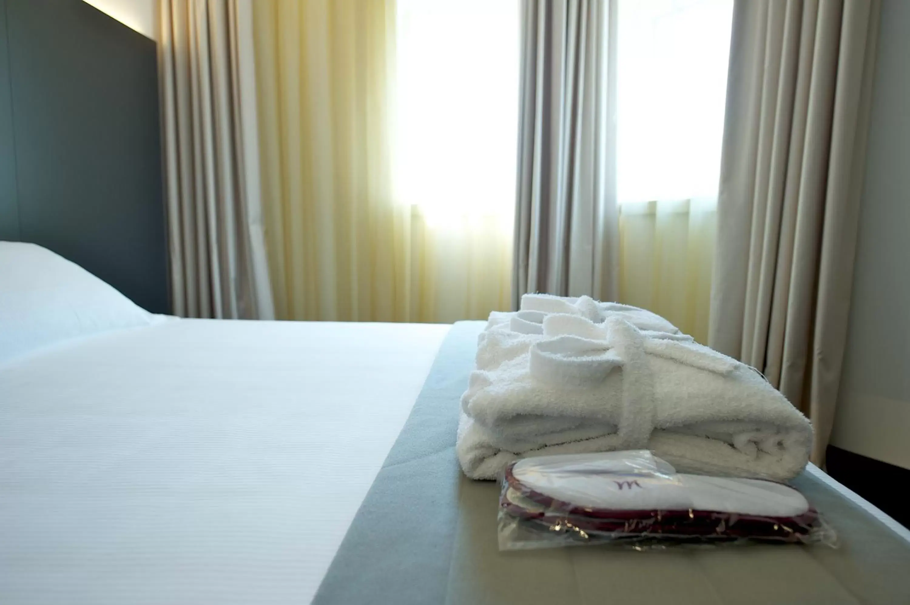 Bed in Mercure Nerocubo Rovereto