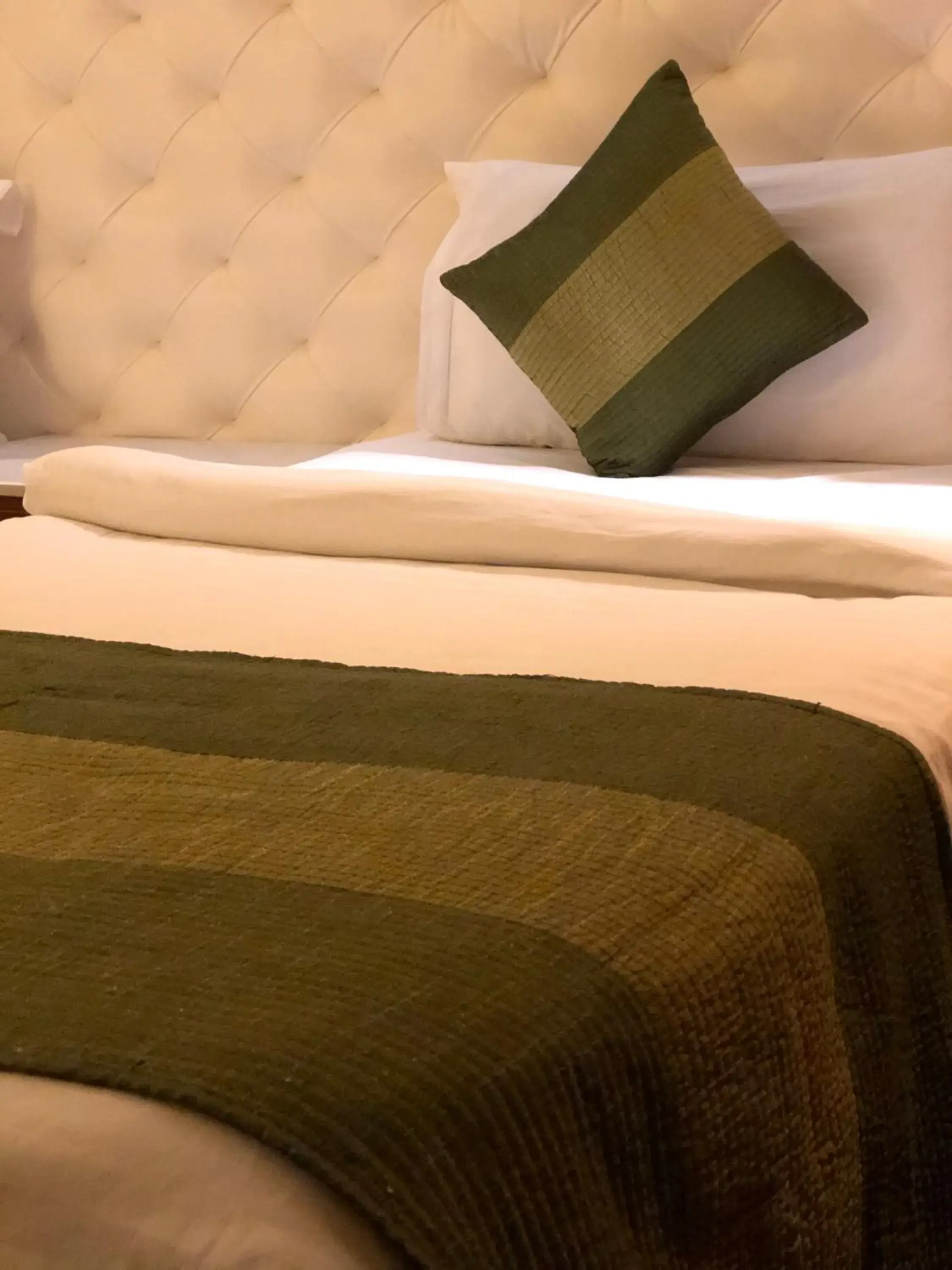 Bed in Hotel Ivory 32