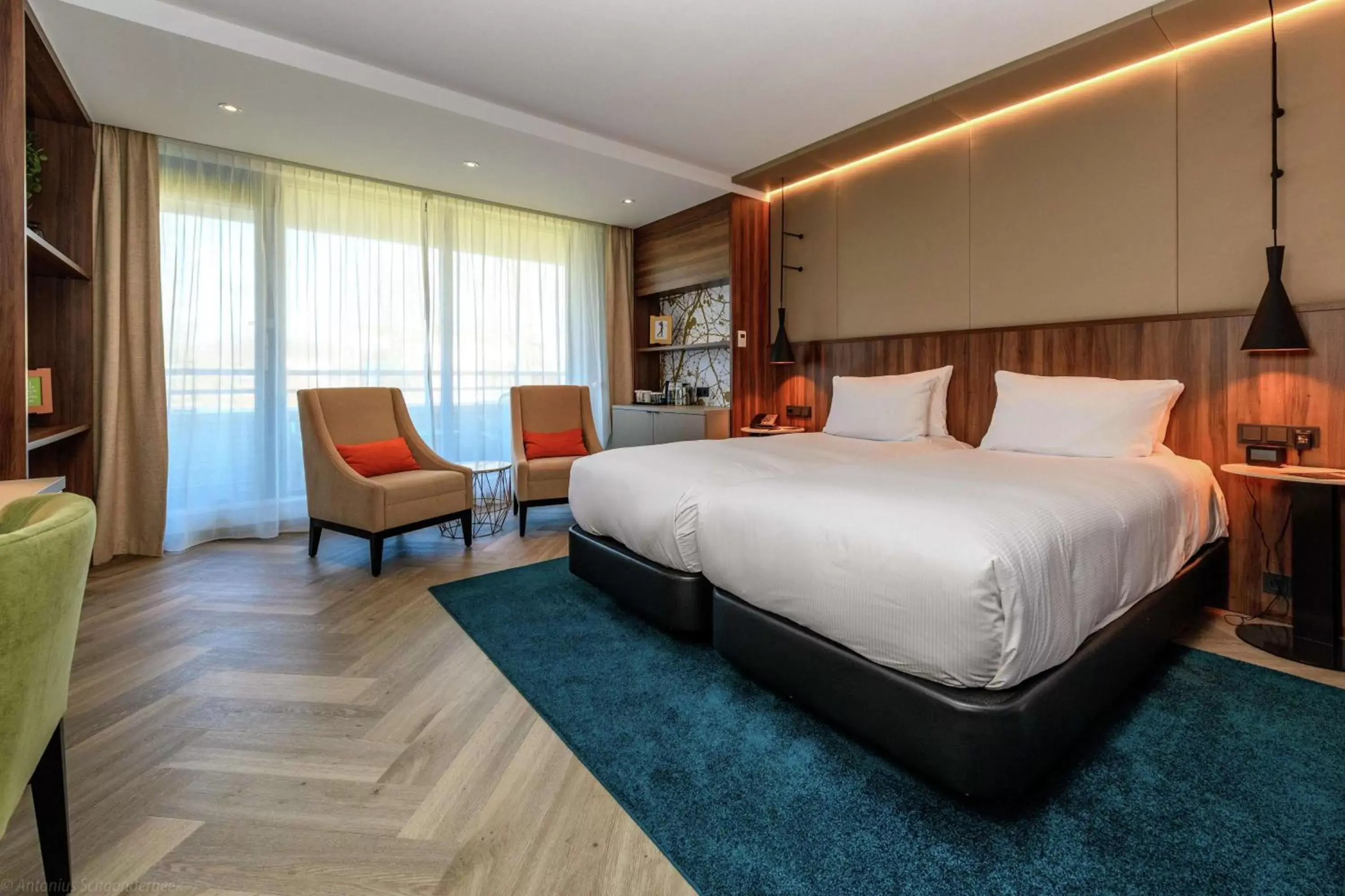 Living room, Bed in DoubleTree by Hilton Royal Parc Soestduinen Living room, Bed in DoubleTree by Hilton Royal Parc Soestduinen
