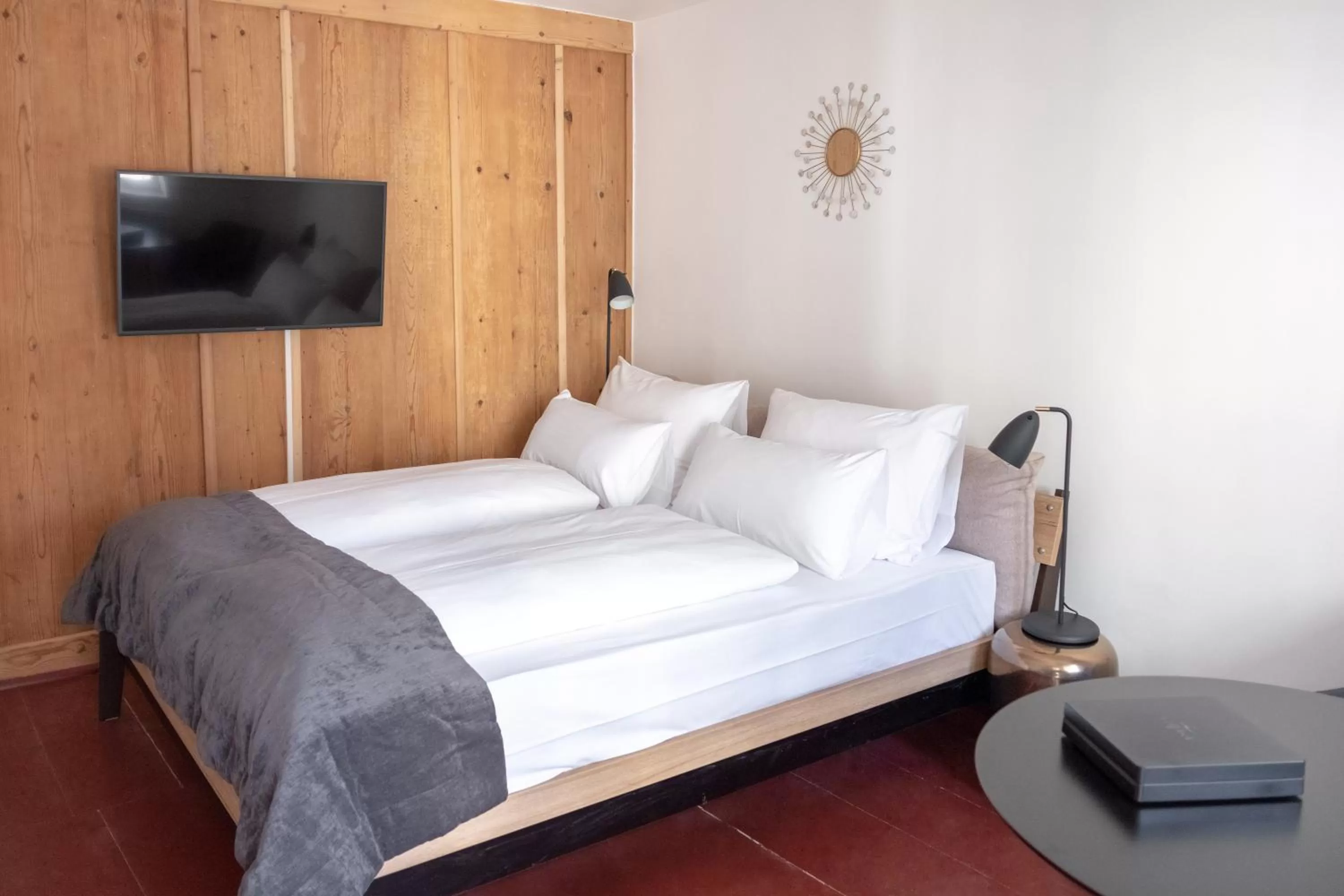 Bed in ANA Living Augsburg City Center by Arthotel ANA - Self-Service-Hotel