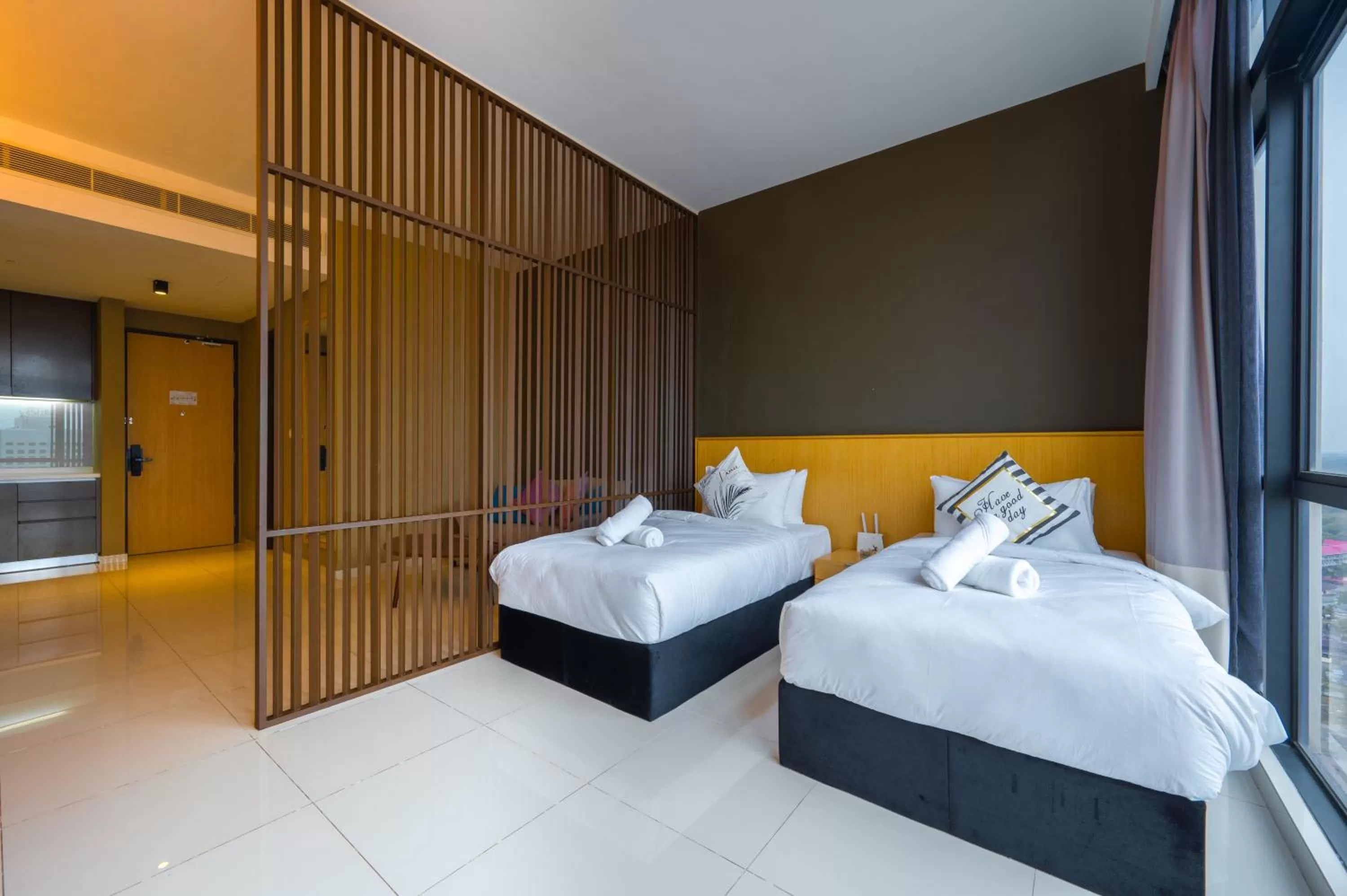 Bed in Greystone 99 Suites