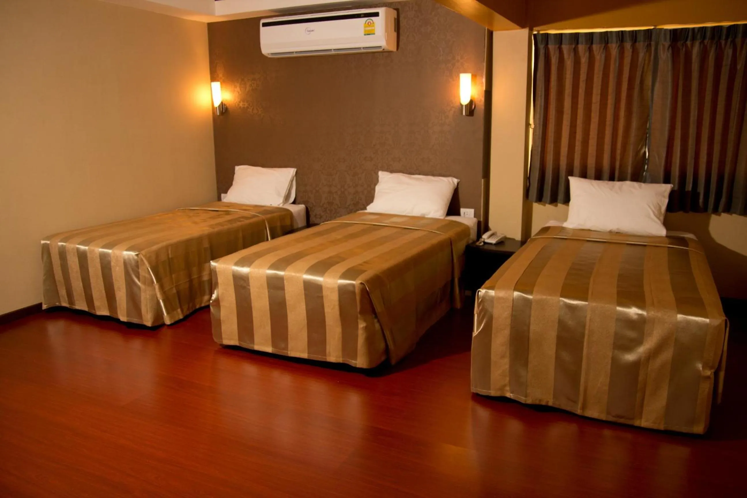 Bed in Visiting Card Hotel & Resort