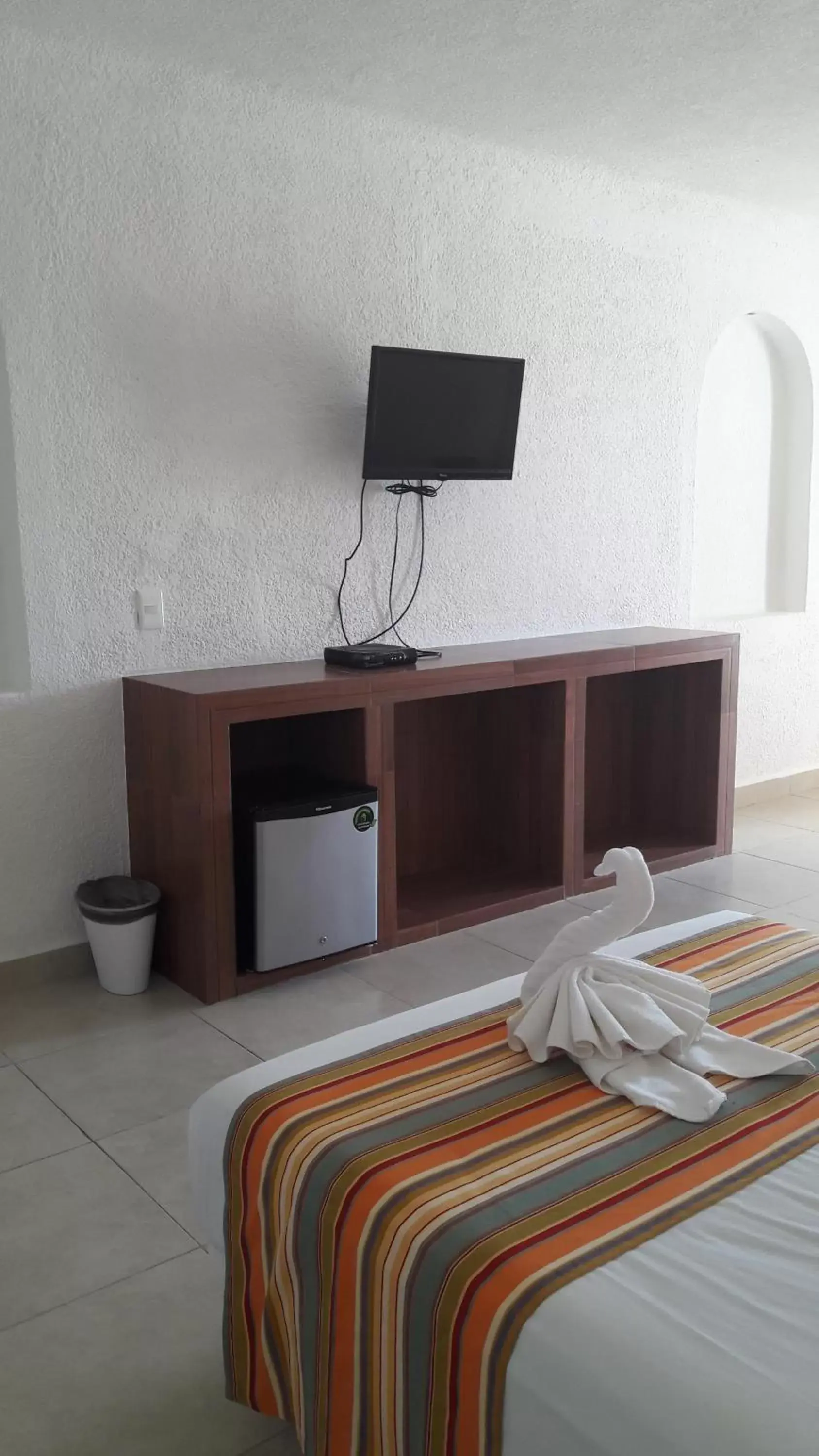 Bedroom, TV/Entertainment Center in Pelicano Inn Playa del Carmen - Beachfront Hotel