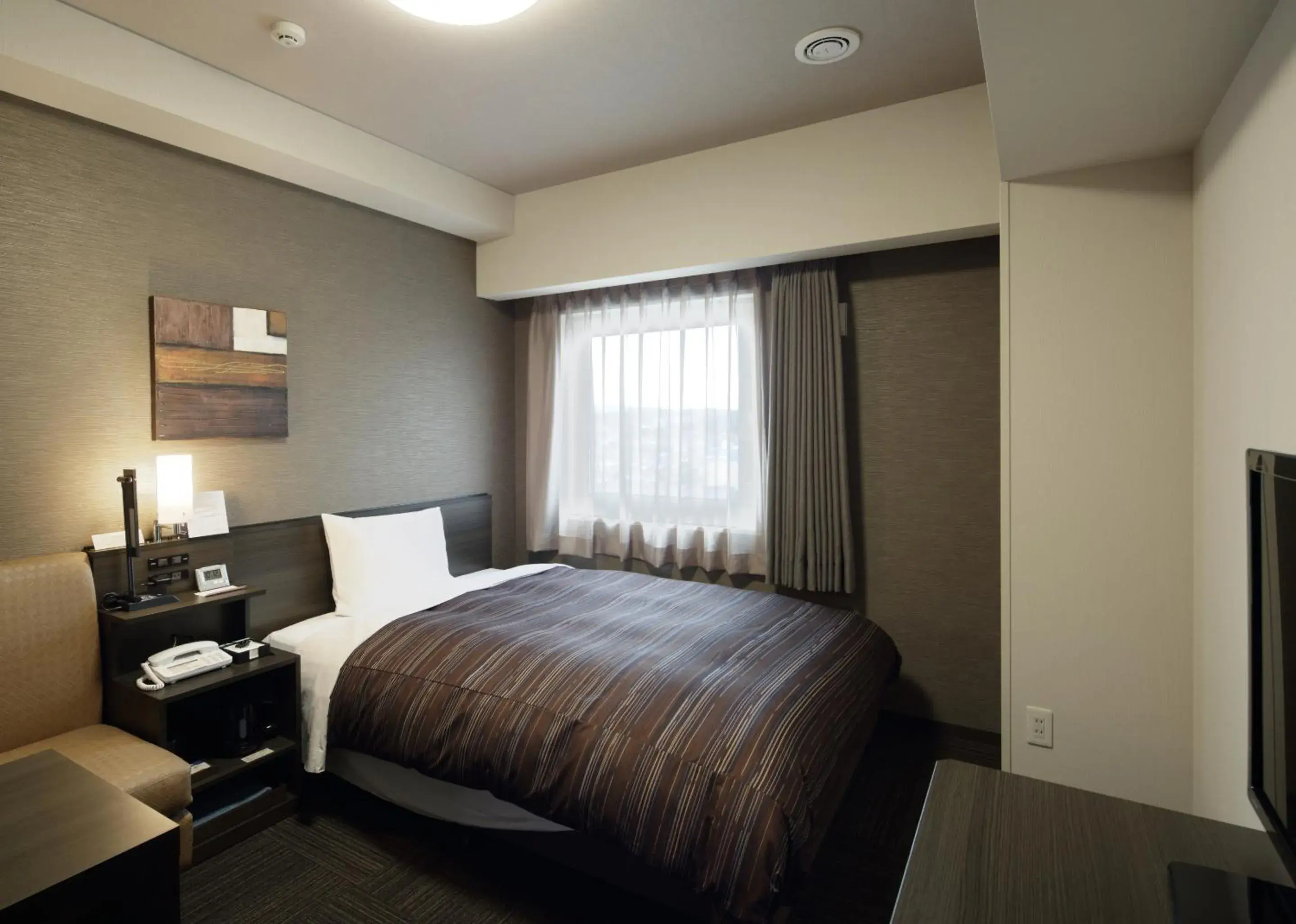 Bed in Hotel Route Inn Ube