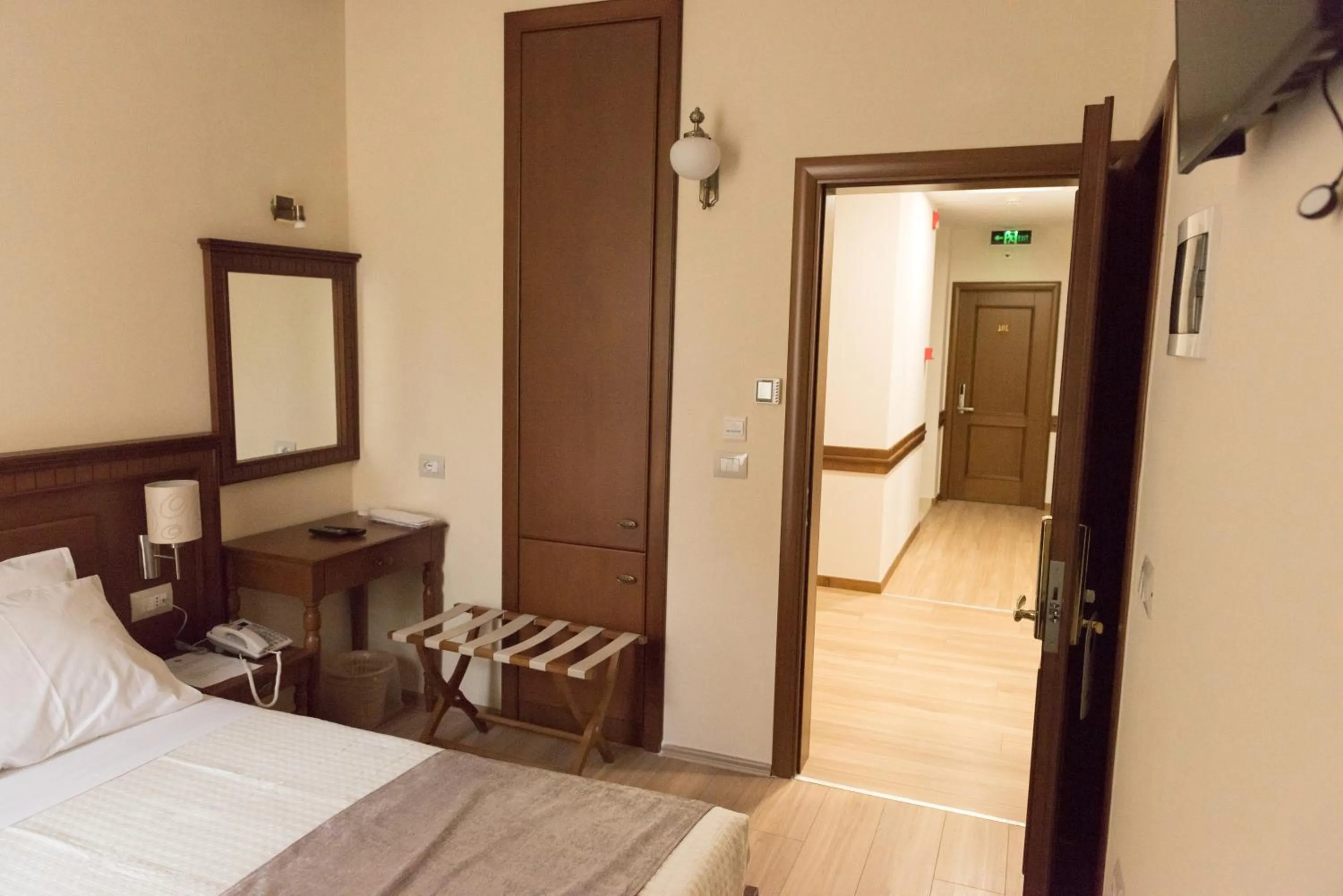 Bed in Hotel Argjiro