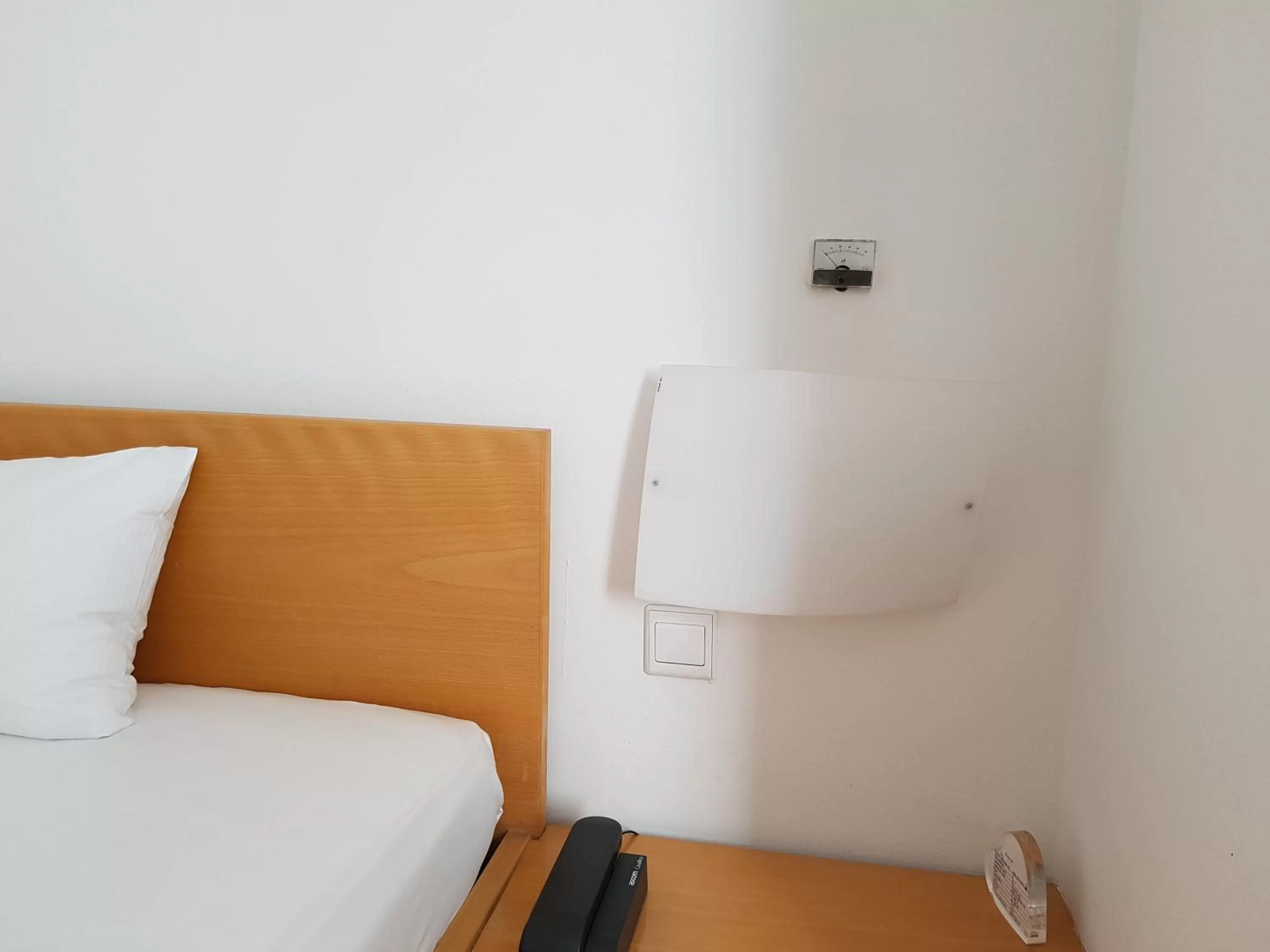 Bed in Art-Hotel Robert Mayer