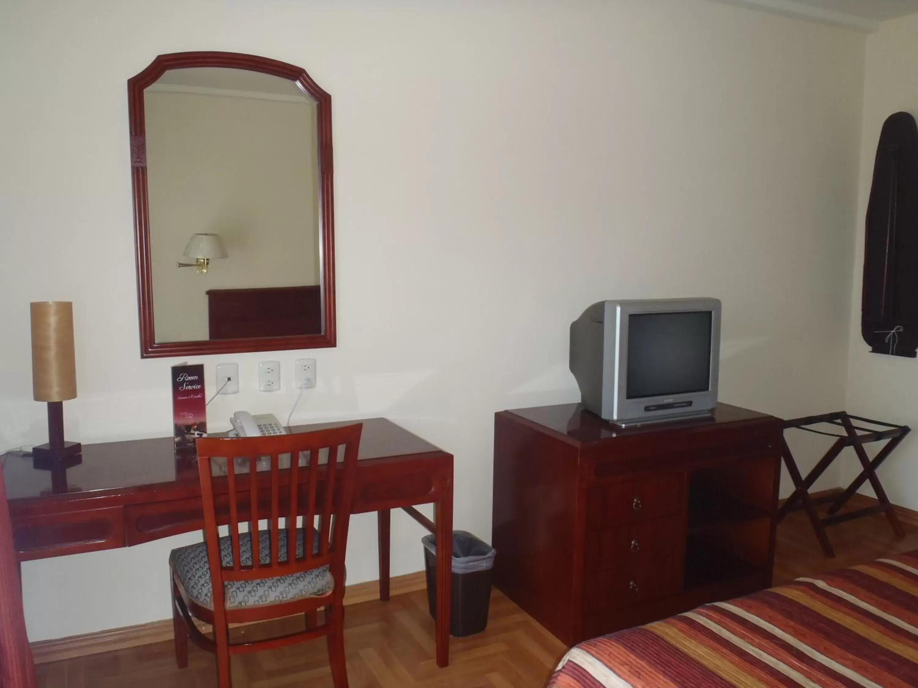 Photo of the whole room, TV/Entertainment Center in Hotel Casa Real Tehuacan