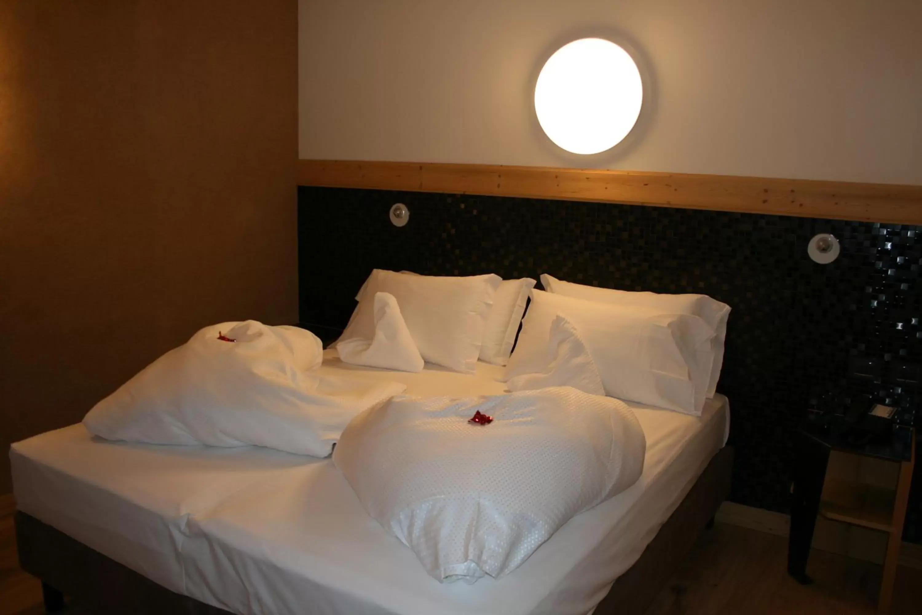 Bed in Hotel Orso Grigio
